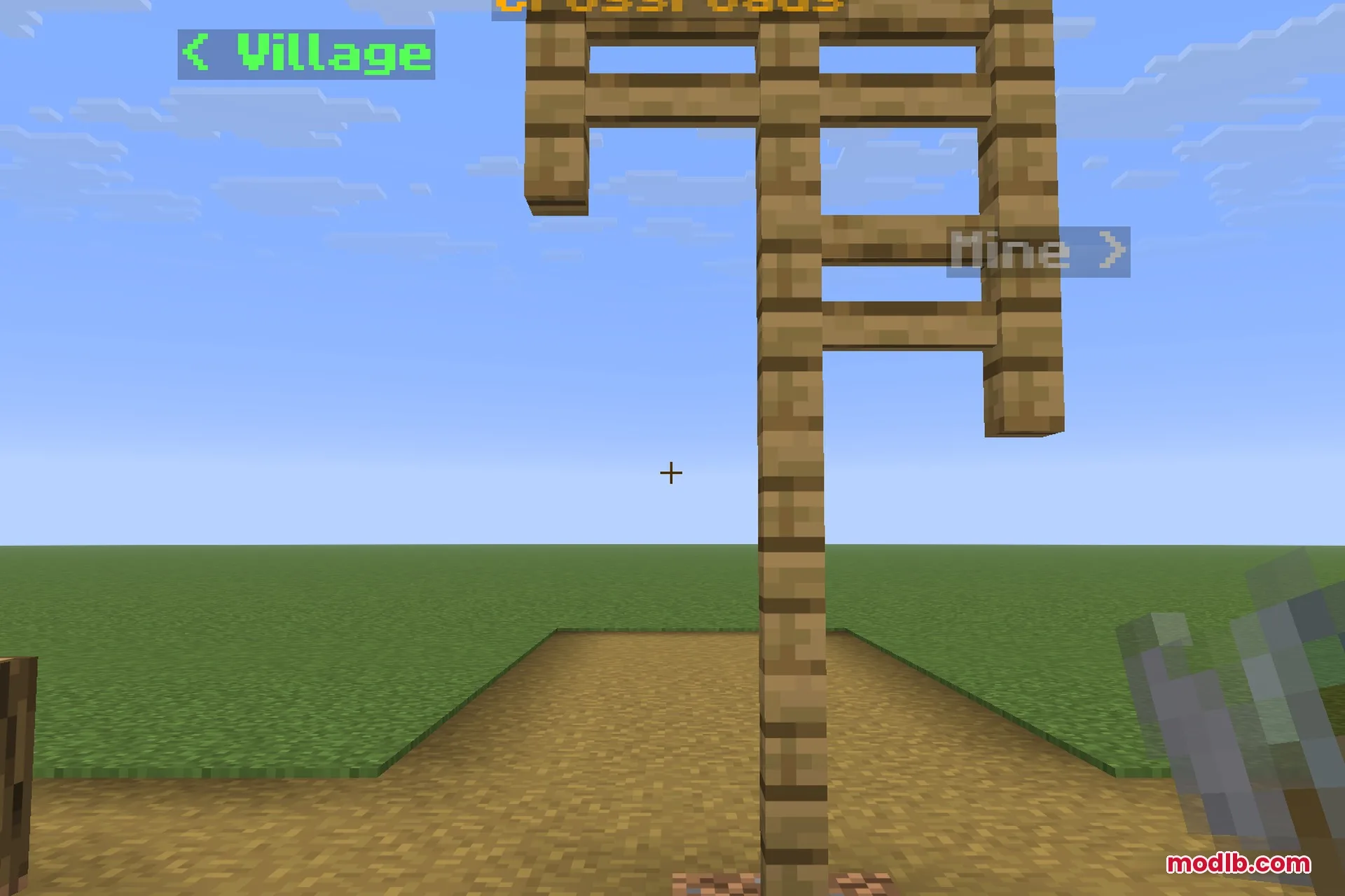 A signpost at a crossroads with three labels pointing different ways