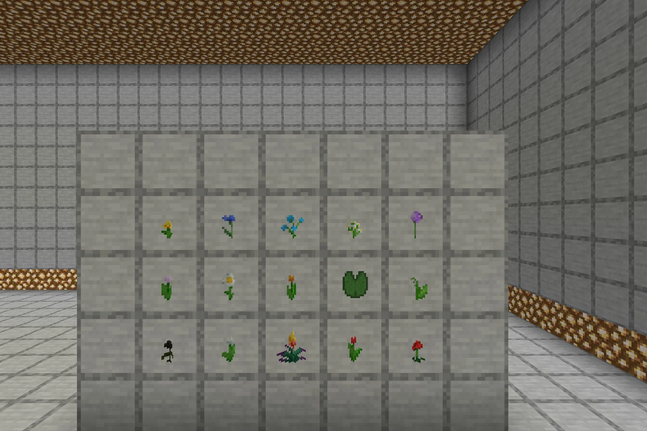 Various Minecraft flowers and a lily pad displayed as 3D models on a wall