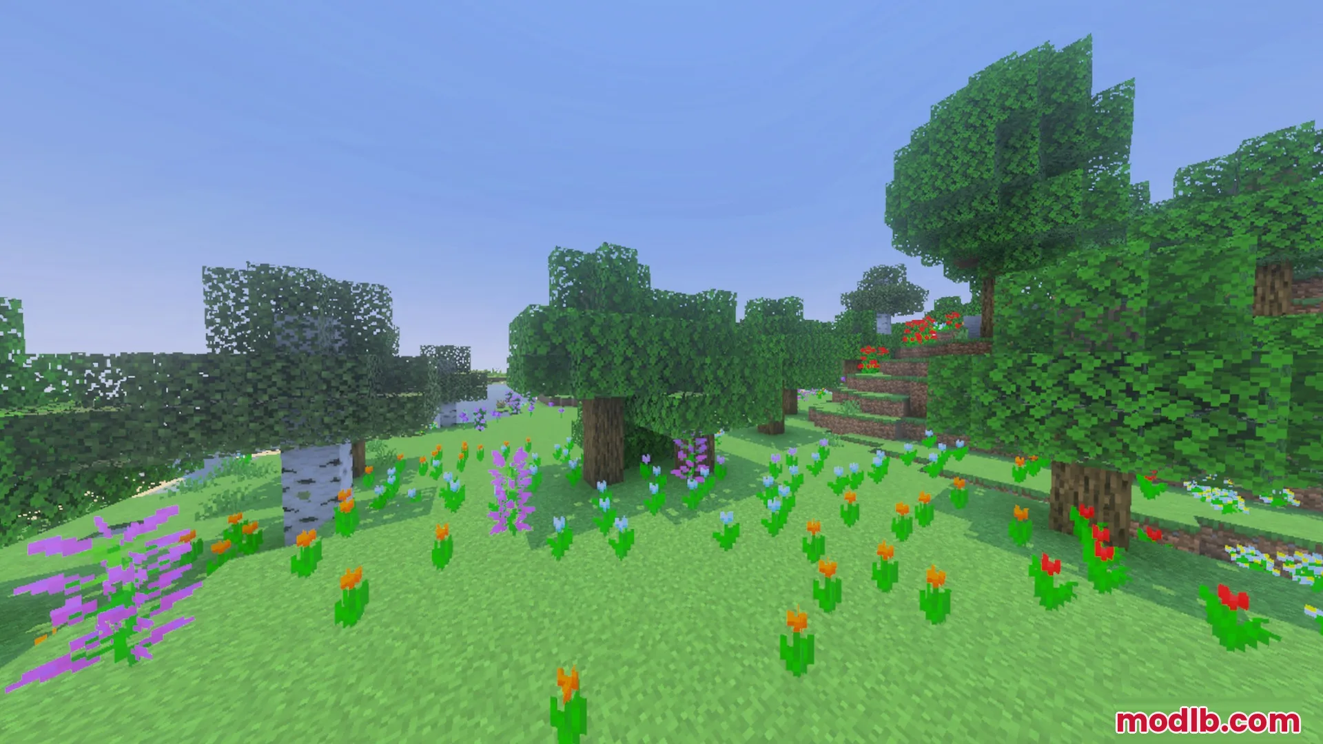 Better Waving Leaves Shader Screenshot 9 Lush green trees and colorful flowers swaying in a sunny Minecraft meadow