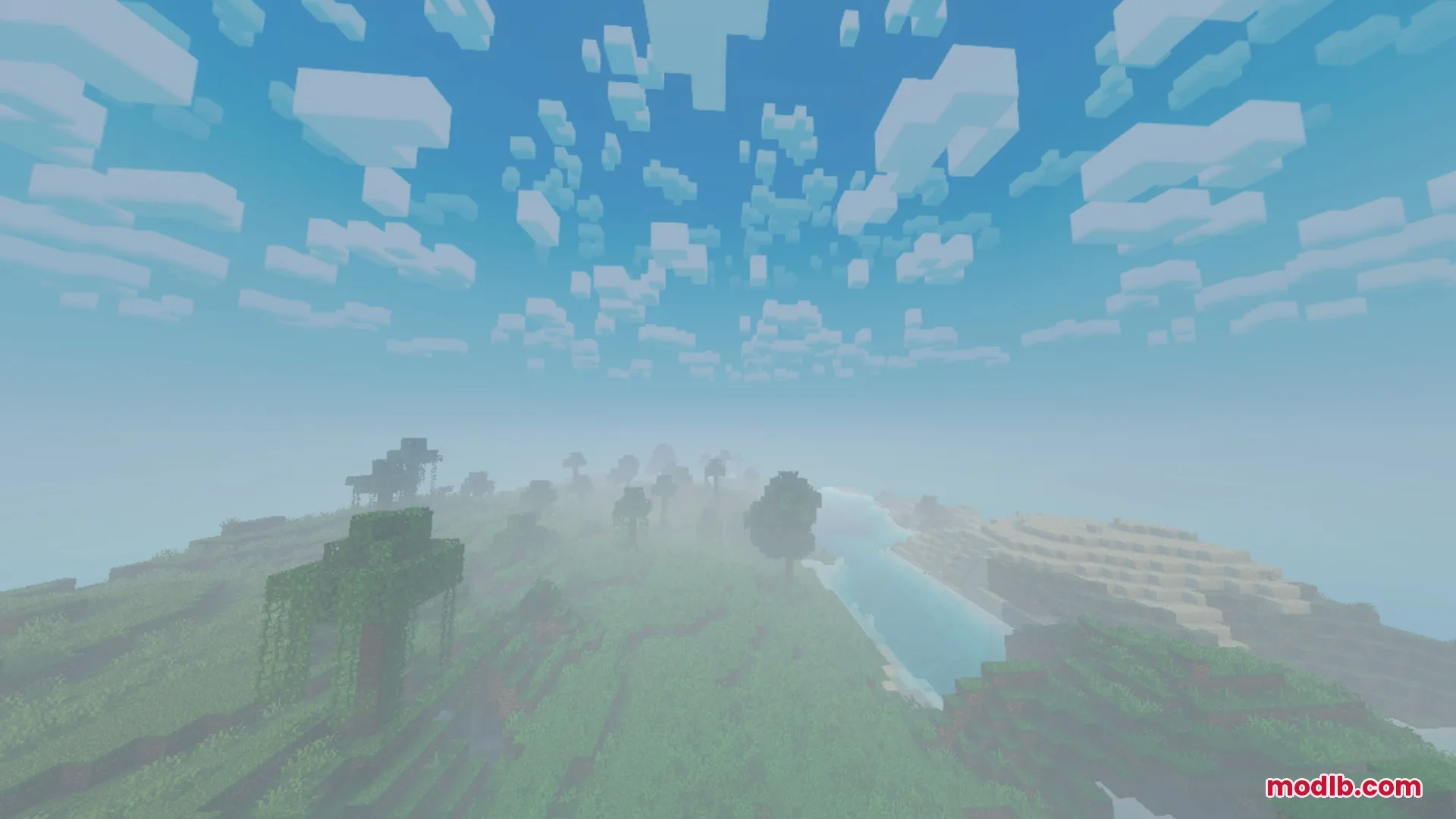 A scenic Minecraft landscape featuring realistic fog over green hills and water
