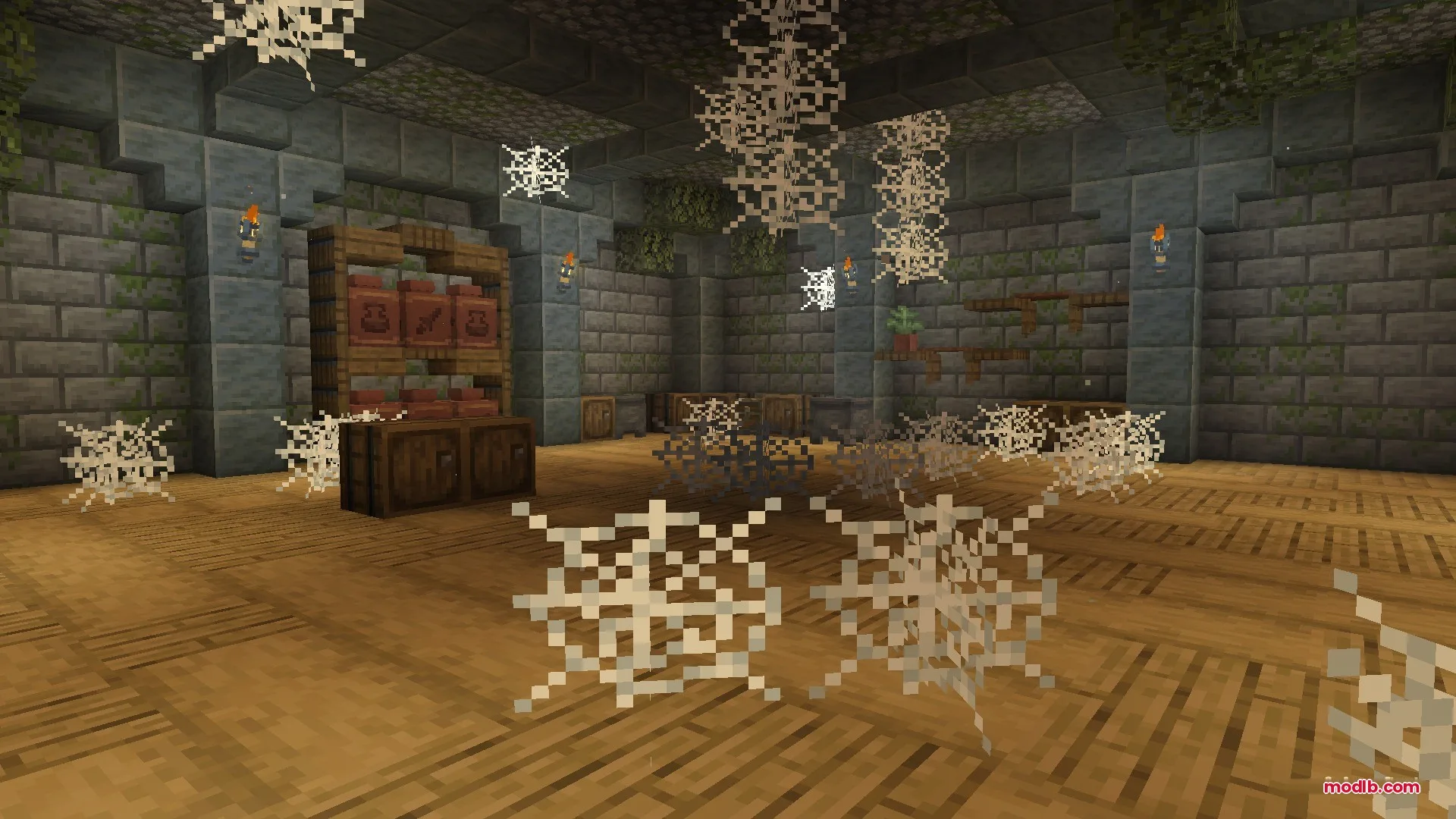 Citadel of Trials Data Pack Screenshot 9 Abandoned stone room with cobwebs and wooden storage containers in a stronghold