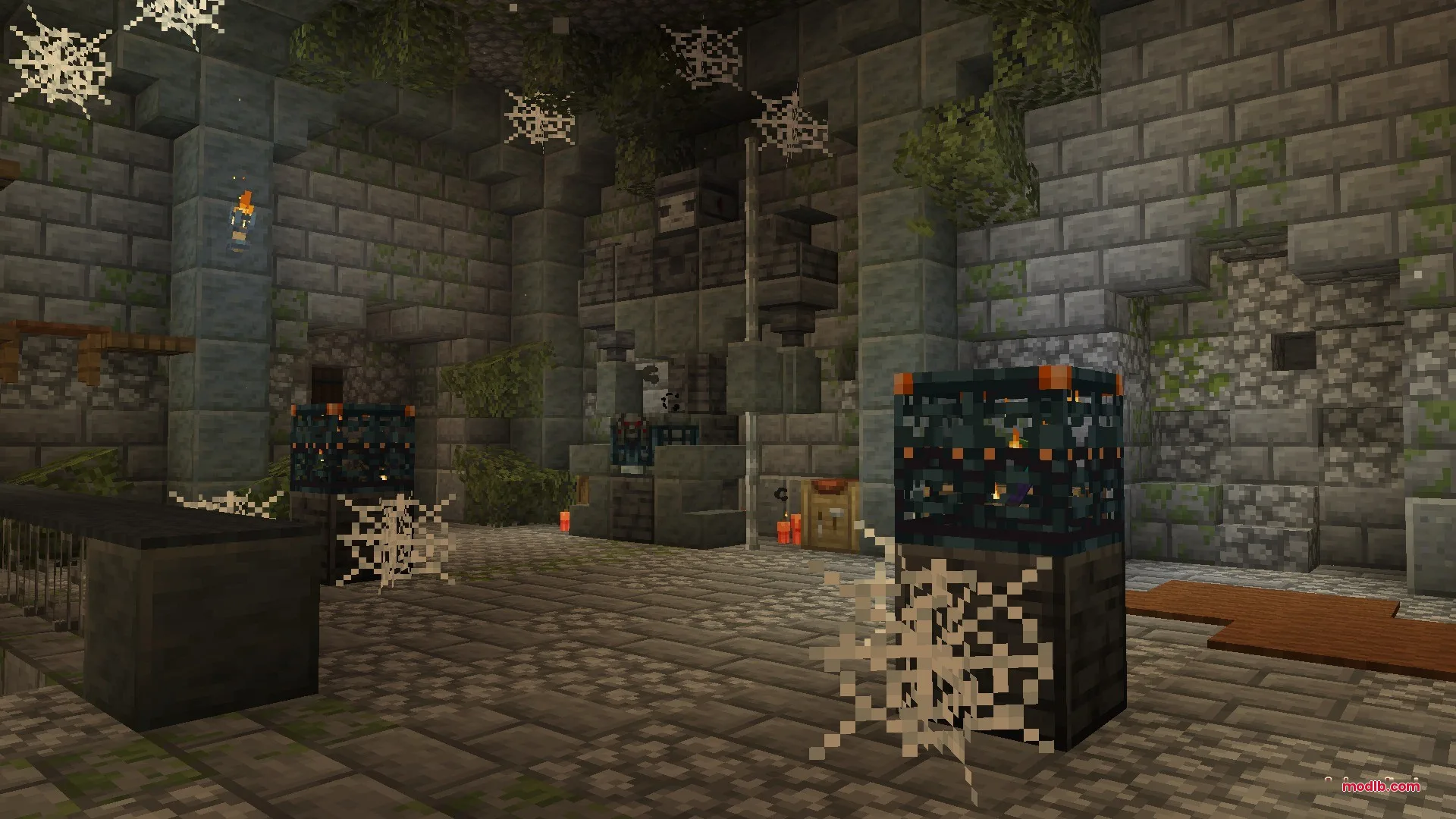 Citadel of Trials Data Pack Screenshot 5 A large stone stronghold chamber featuring trial spawners and hanging cobwebs