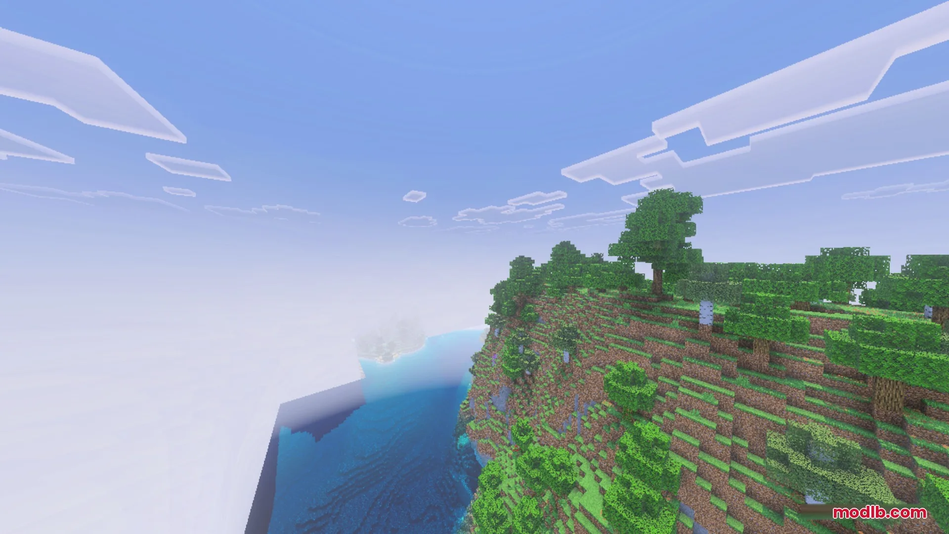 CLEAR FOG VISUAL Shader Screenshot 1 A high angle view of a grassy cliff overlooking the vast blue ocean