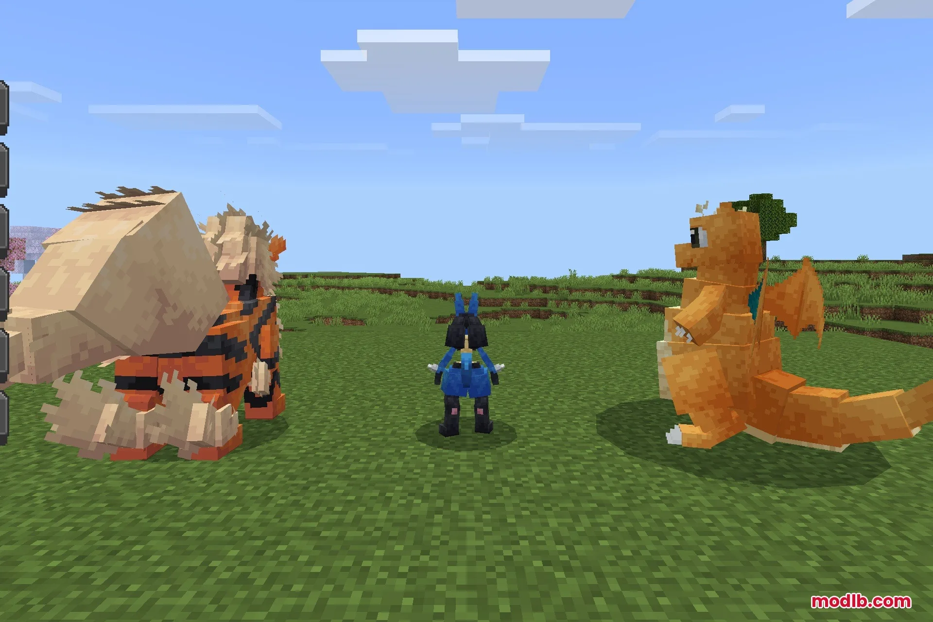 Arcanine Lucario and Dragonite standing together in a grassy Minecraft field