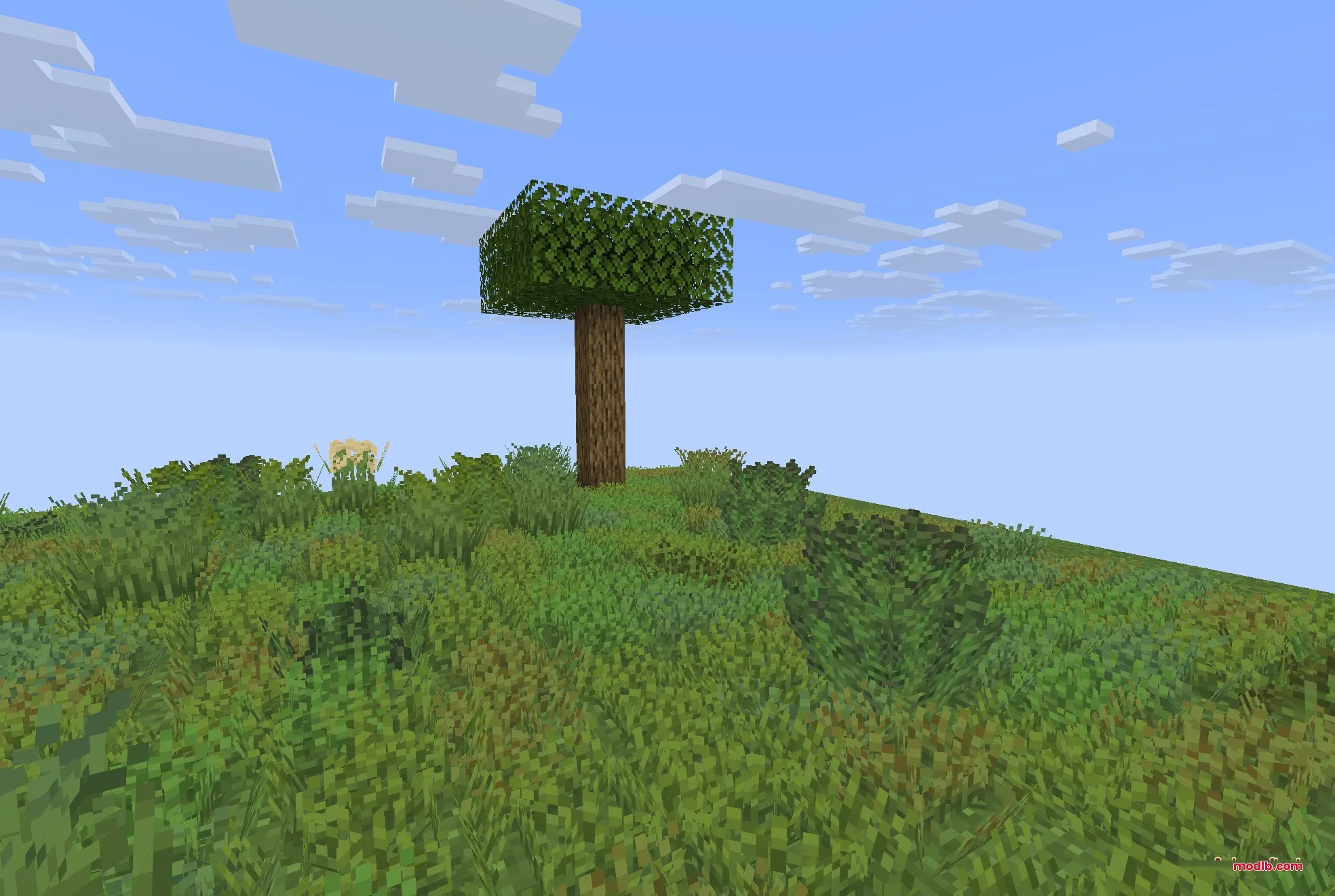 Colorful Grasses 9minecraft Resource Pack Screenshot 3 A lone tree stands on a hill covered in lush and varied grass