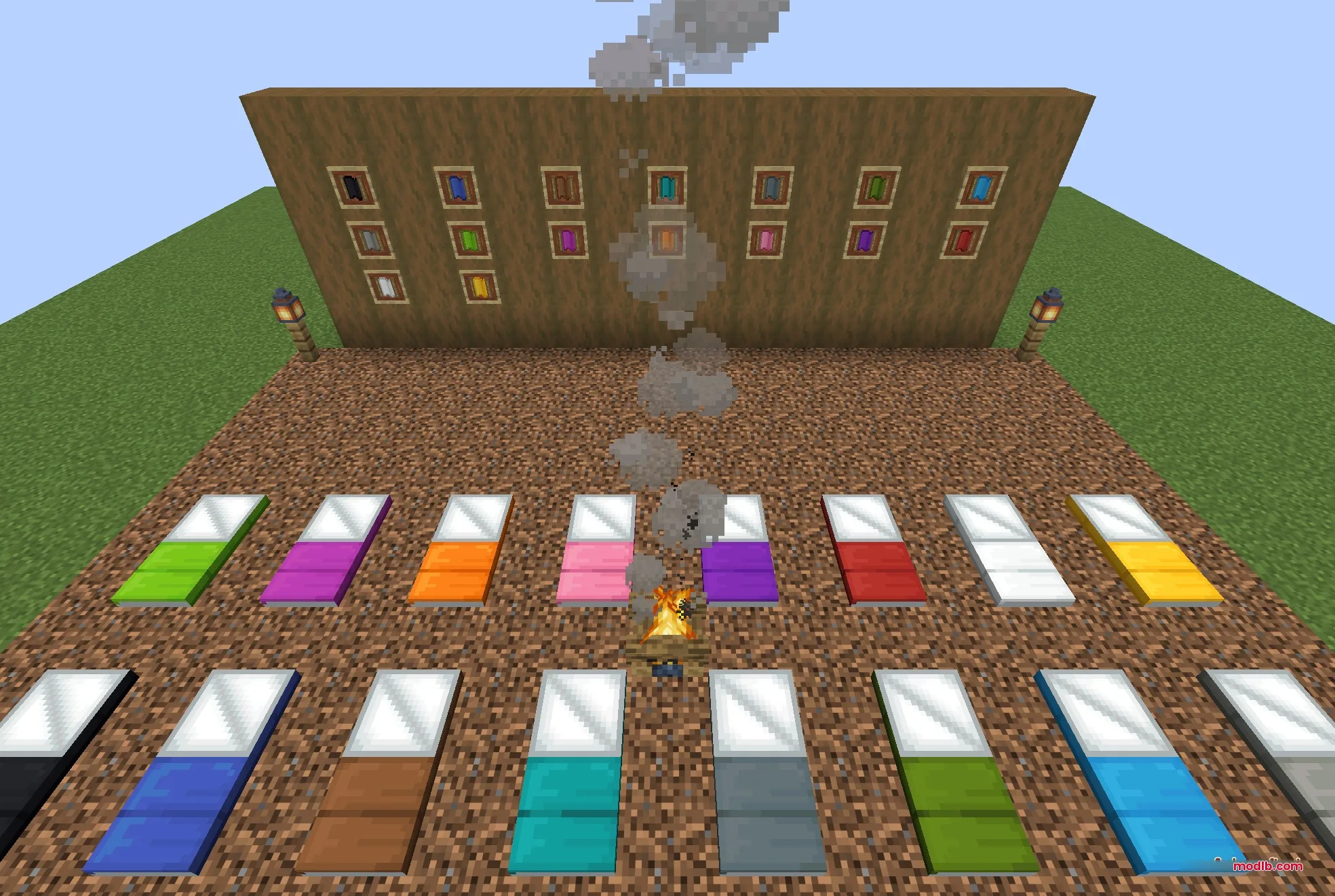 Comforts Modernized 9minecraft Resource Pack Screenshot 5 Colorful sleeping bags and hammocks arranged around a campfire in Minecraft