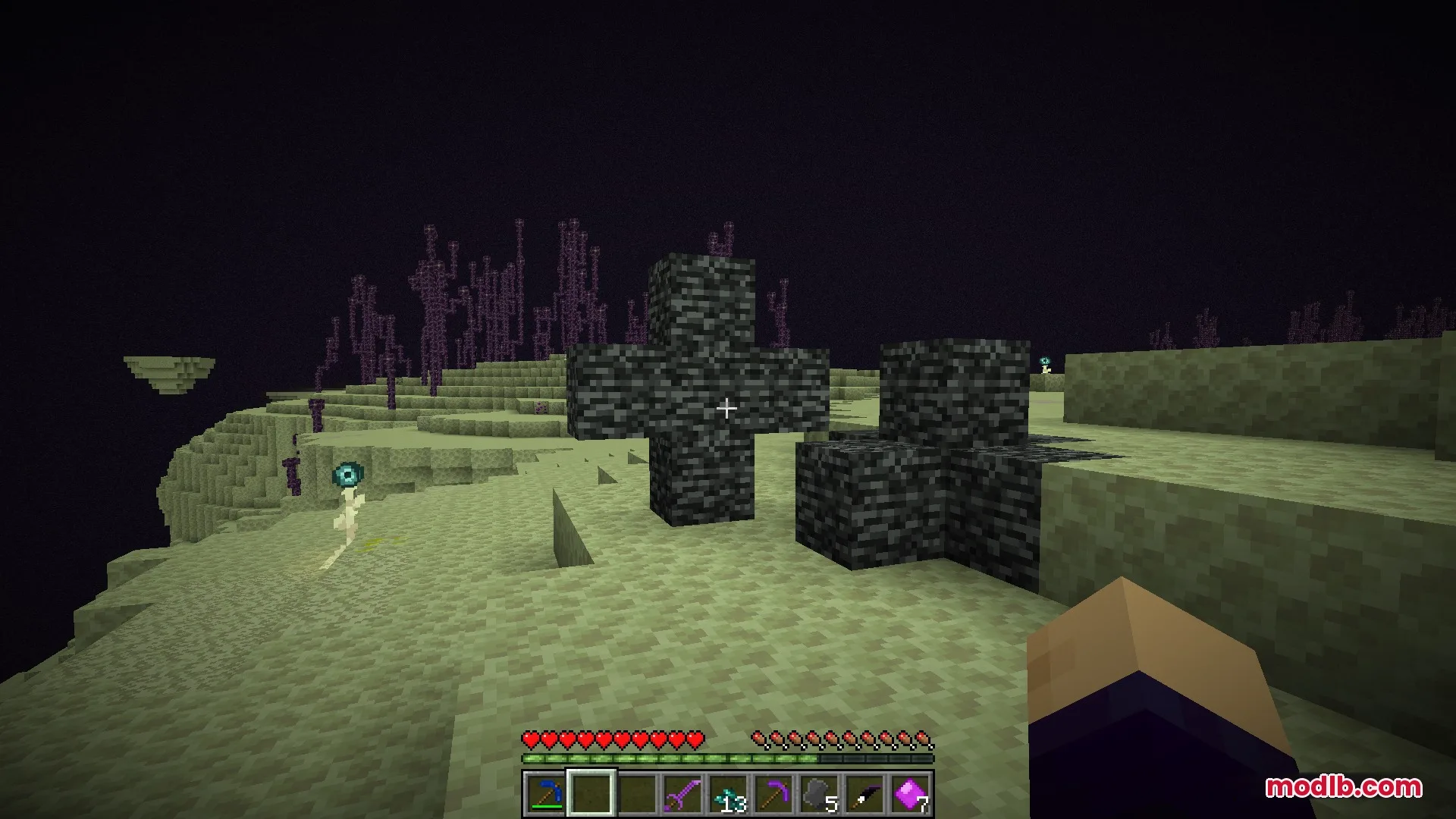 Enderfy Mod Screenshot 8 A player discovers mysterious bedrock cross structures on a floating End island