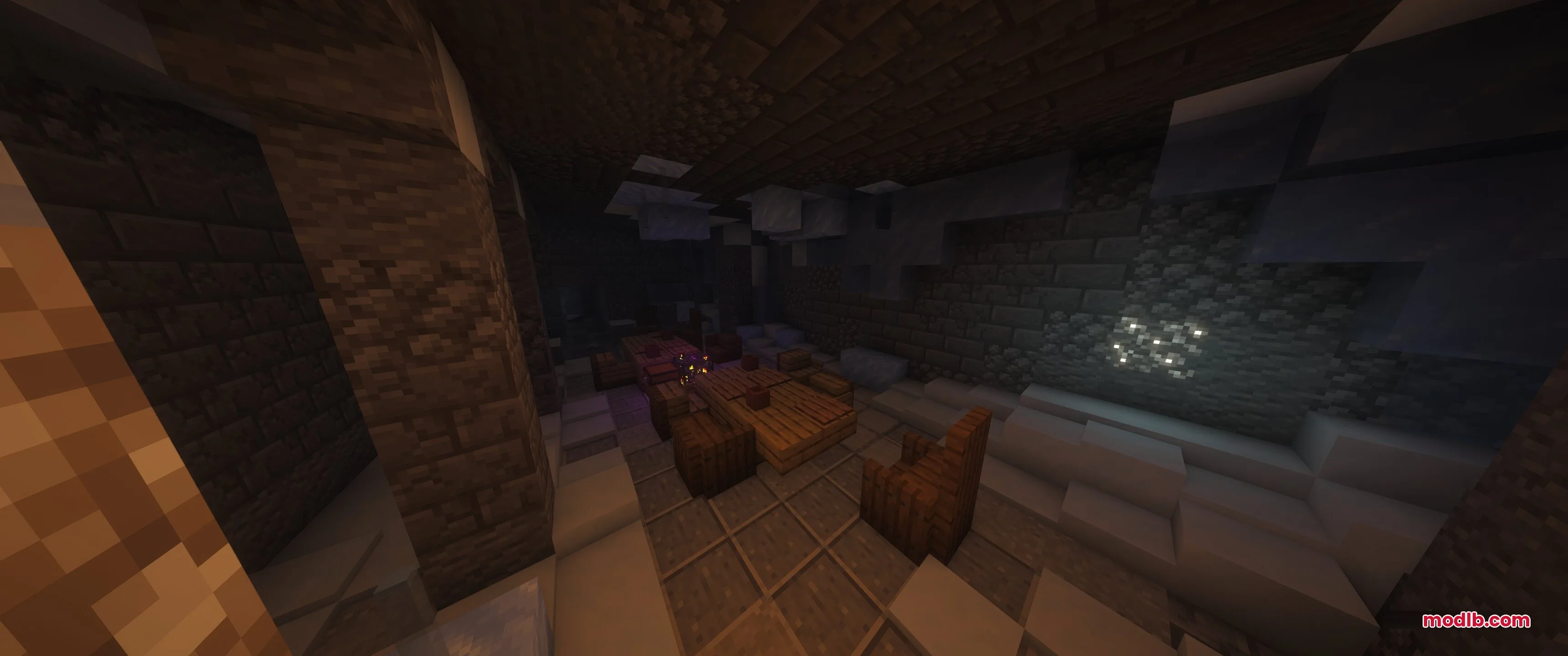 Epic Structures Dungeons Data Pack Screenshot 10 Spacious dungeon room with wooden furniture and stone walls in a snowy biome