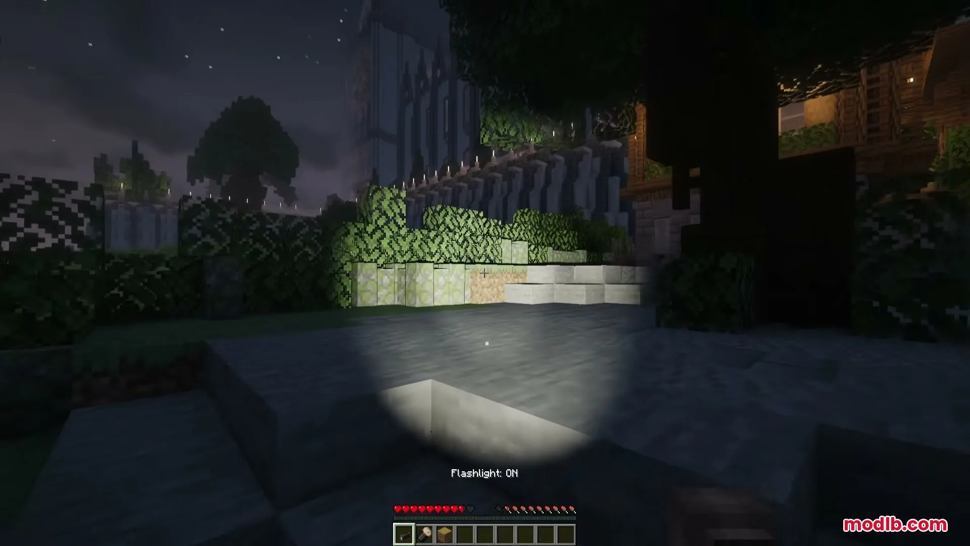 Flashier Flashlights Mod Screenshot 2 The Flashier Flashlights mod illuminates a dark stone path at night