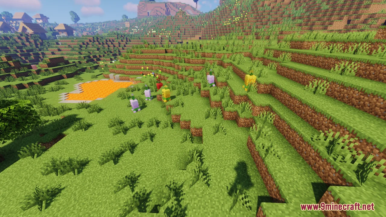 Several colorful flower creatures wandering near a lava pool in a grassy landscape