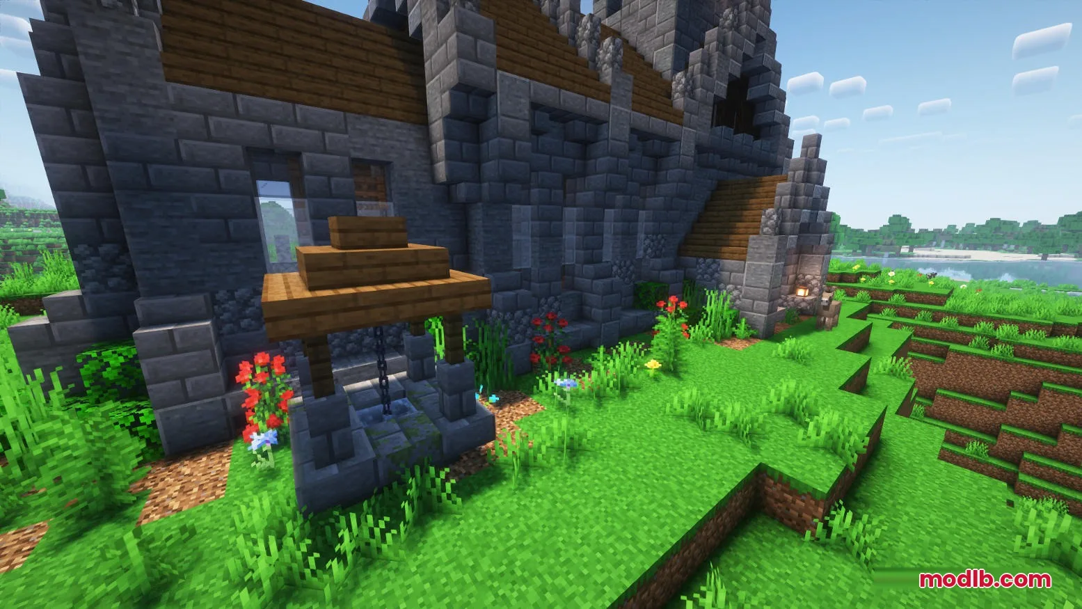 Hallowed Spires Crypt Mod Screenshot 1 A stone Gothic church exterior featuring a small wooden well and flowers