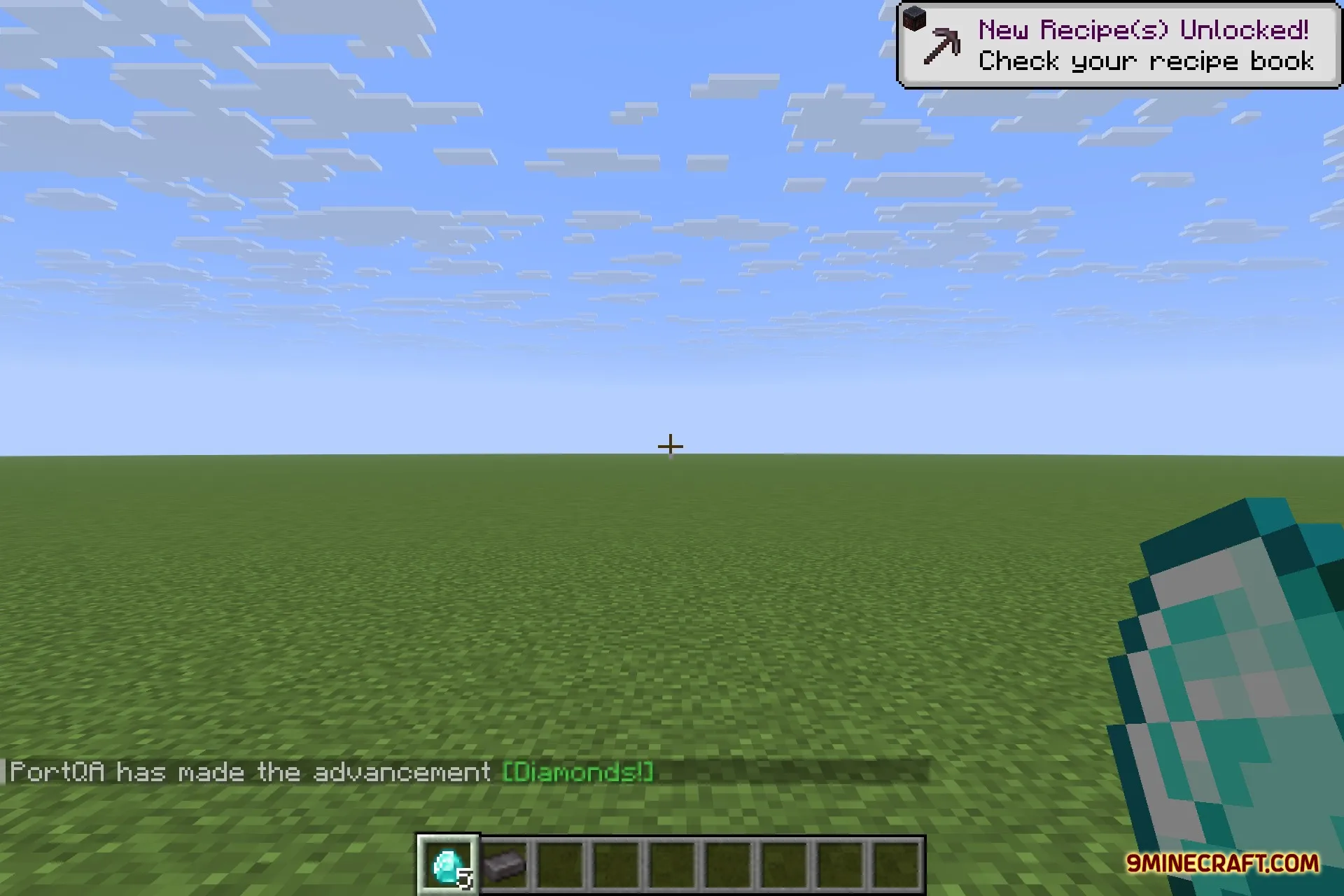 Icterine 9minecraft Mod Screenshot 3 Player holding a diamond in a flat world while unlocking the Diamonds advancement