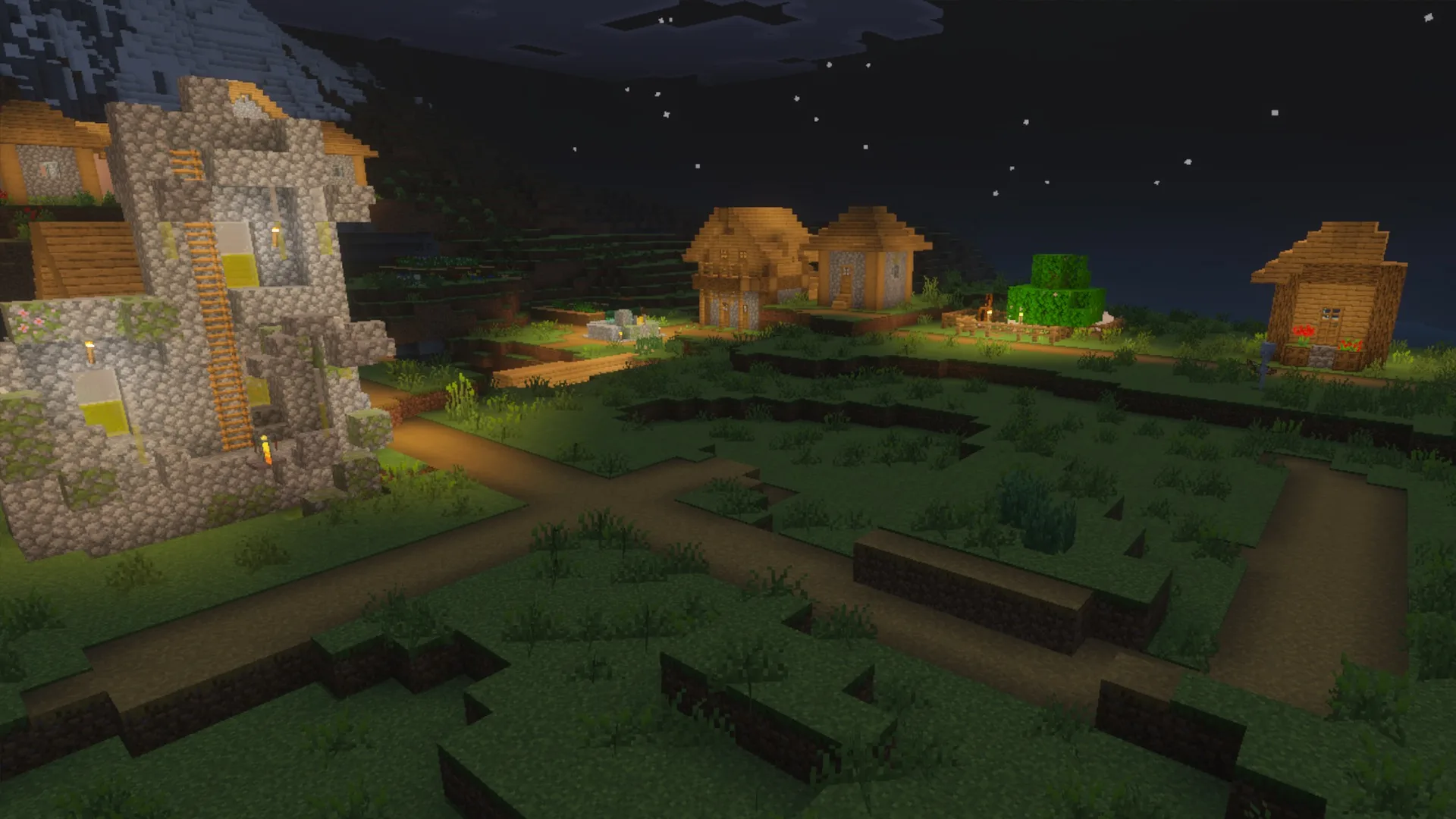 The village at night showing lighting and glowing blocks in the La Nature pack