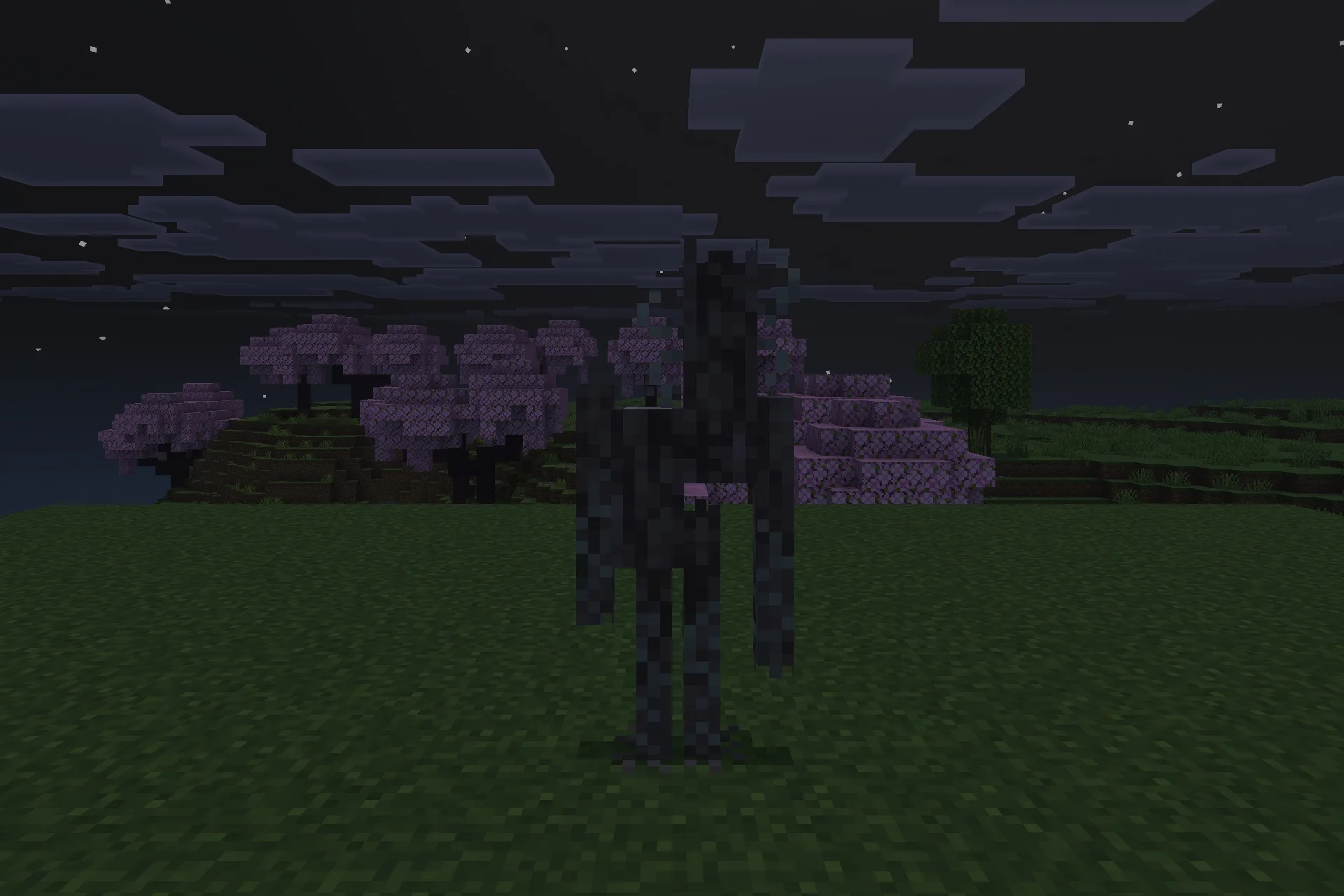 A tall shadowy creature standing in a field near pink cherry blossom trees