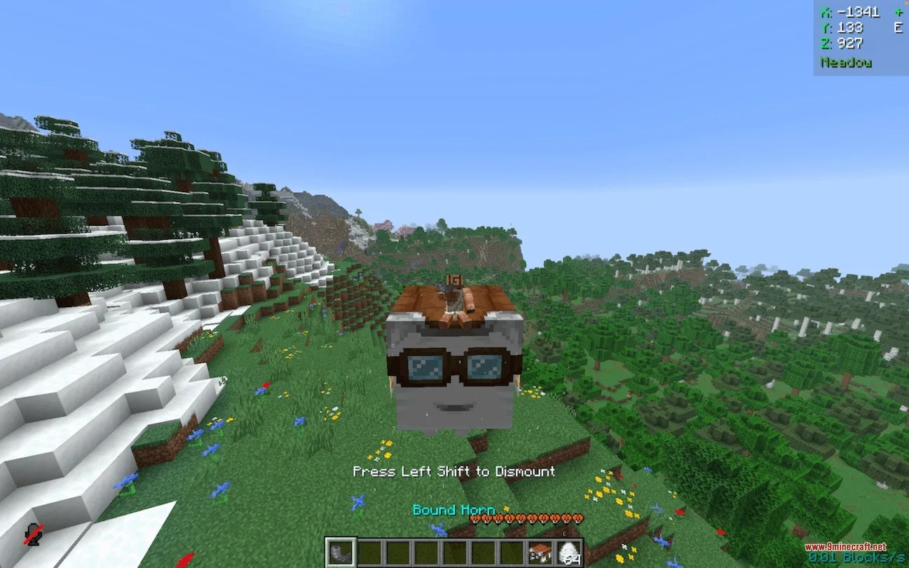 A player riding a small white Happy Ghast in a meadow biome