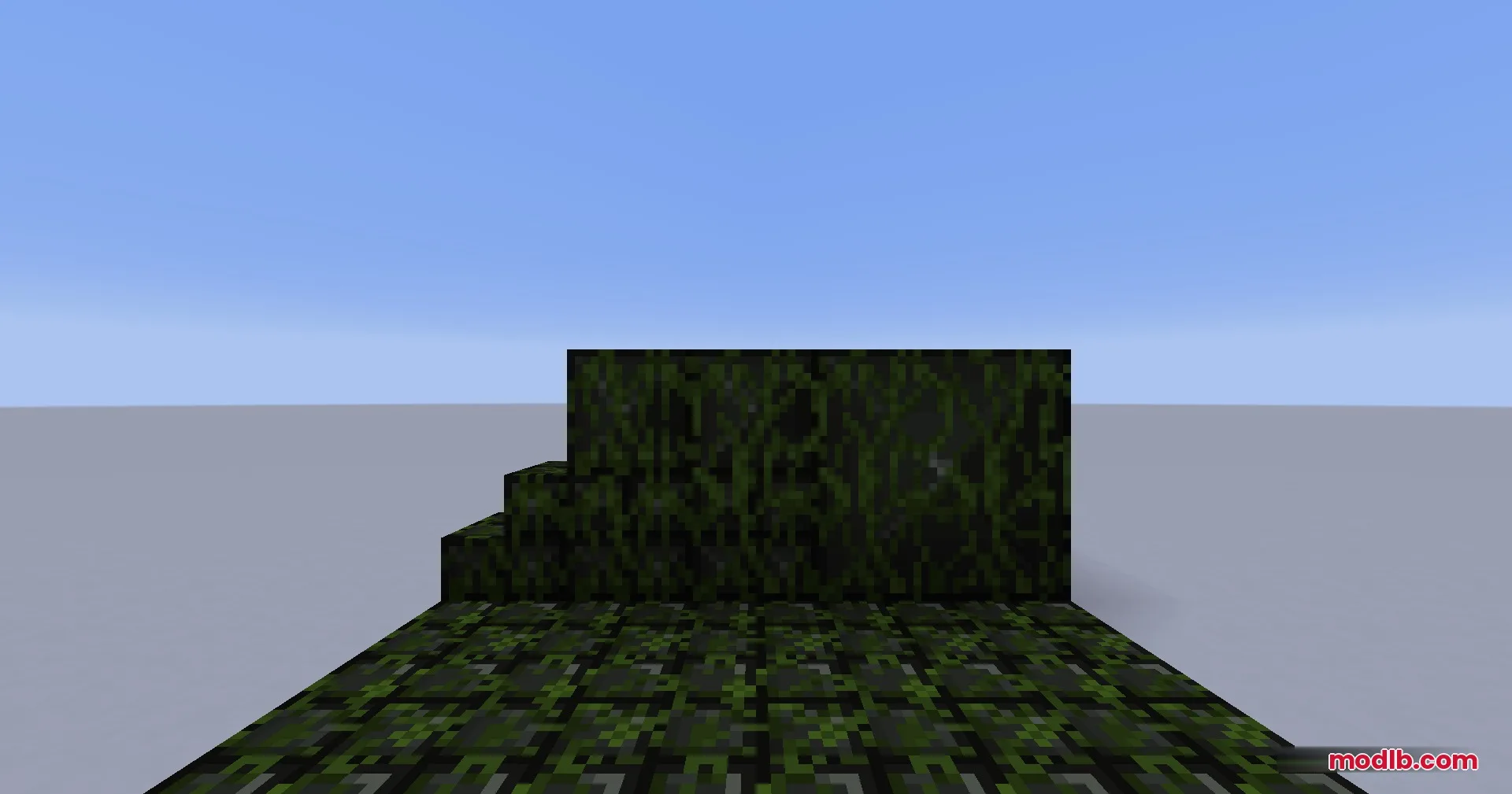 Portal Mod Portal 1 Blocks Resource Pack Screenshot 6 Overgrown mossy variants of the blackplate blocks displayed in a flat world