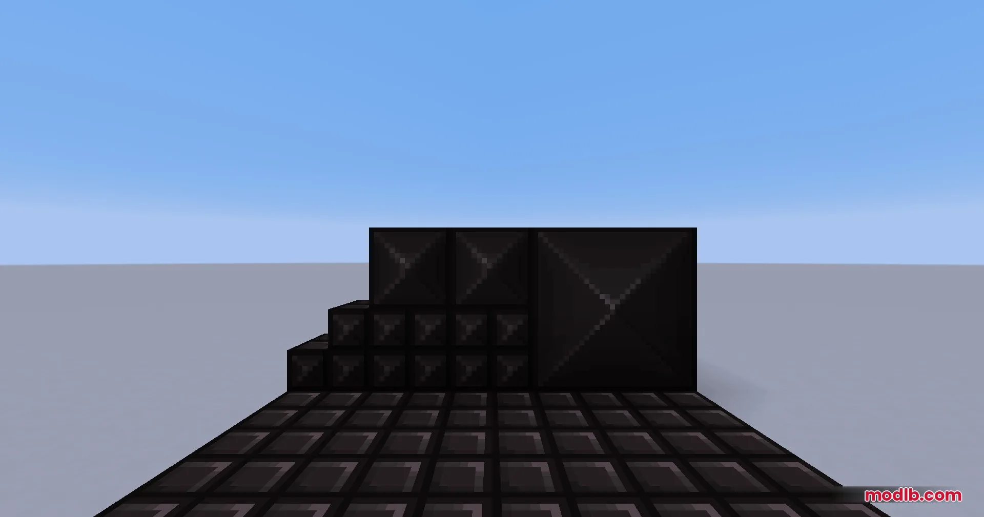 Portal Mod Portal 1 Blocks Resource Pack Screenshot 5 Dark metallic blackplate blocks arranged in a simple structure on flat ground