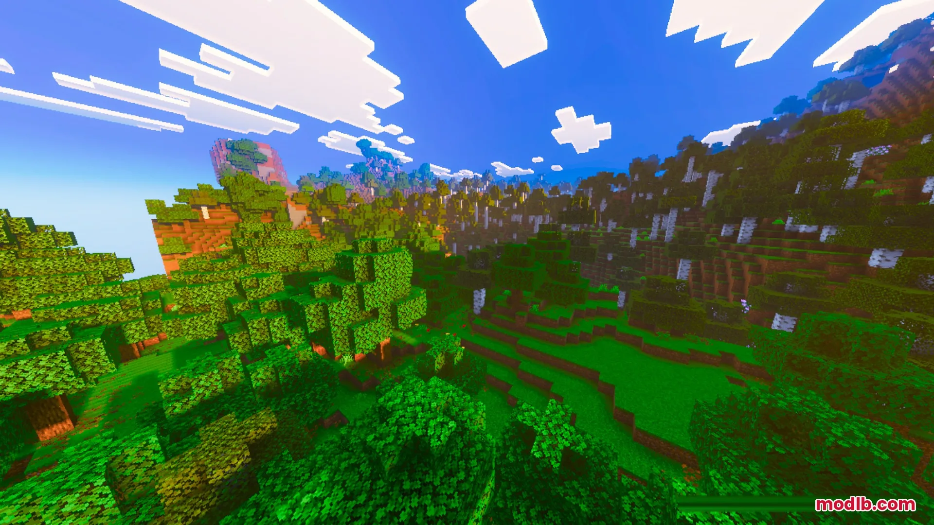 Prismatic Visuals Shader Screenshot 6 A lush green forest biome with rolling hills under a bright blue sky