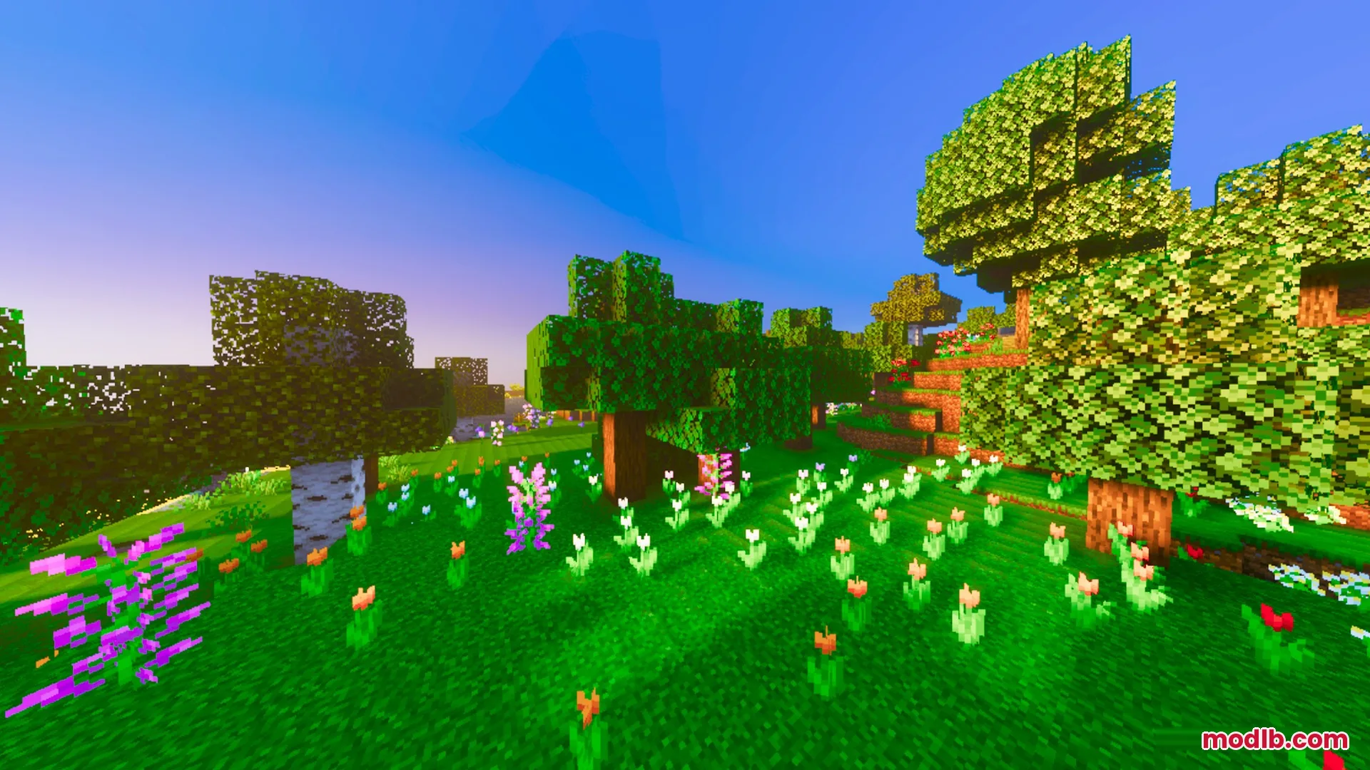 Prismatic Visuals Shader Screenshot 9 Vibrant flower forest with colorful tulips and lush green grass under blue sky