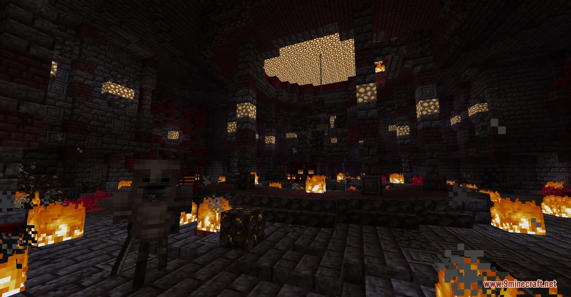Wither skeleton inside a dark nether monument with fire and glowstone lighting