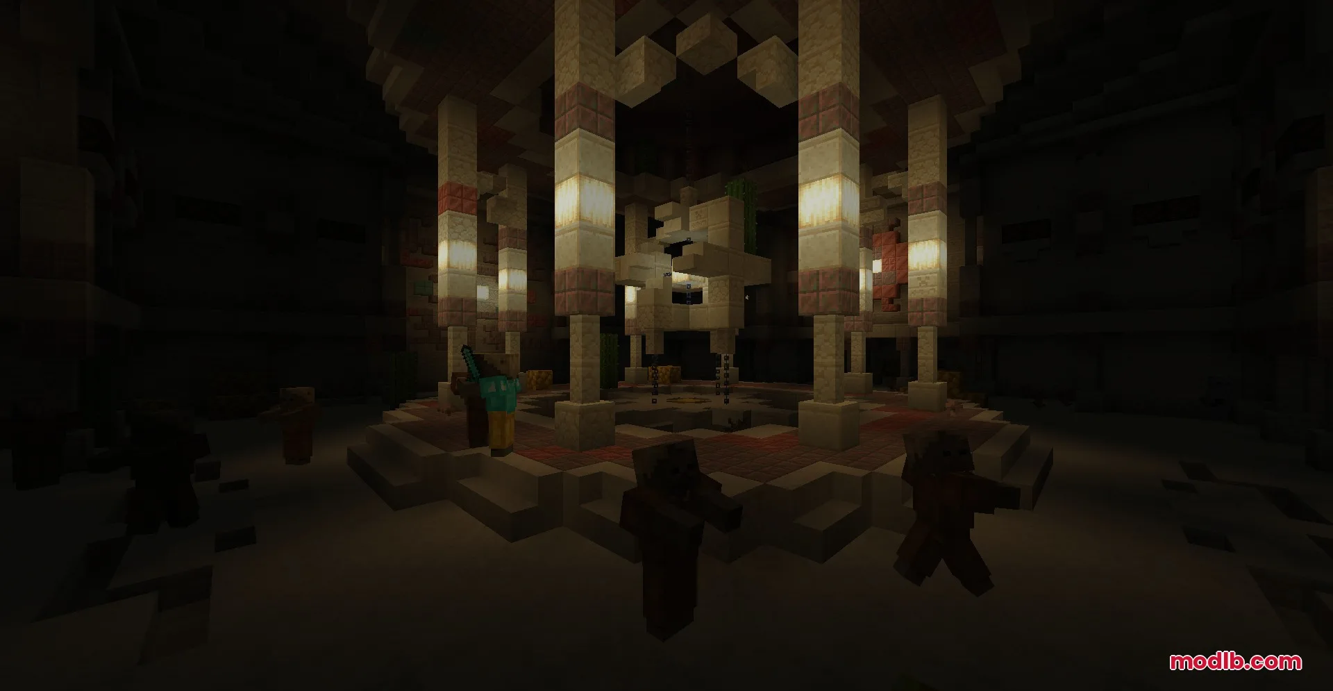 The dark interior of a desert monument featuring sandstone pillars and husks