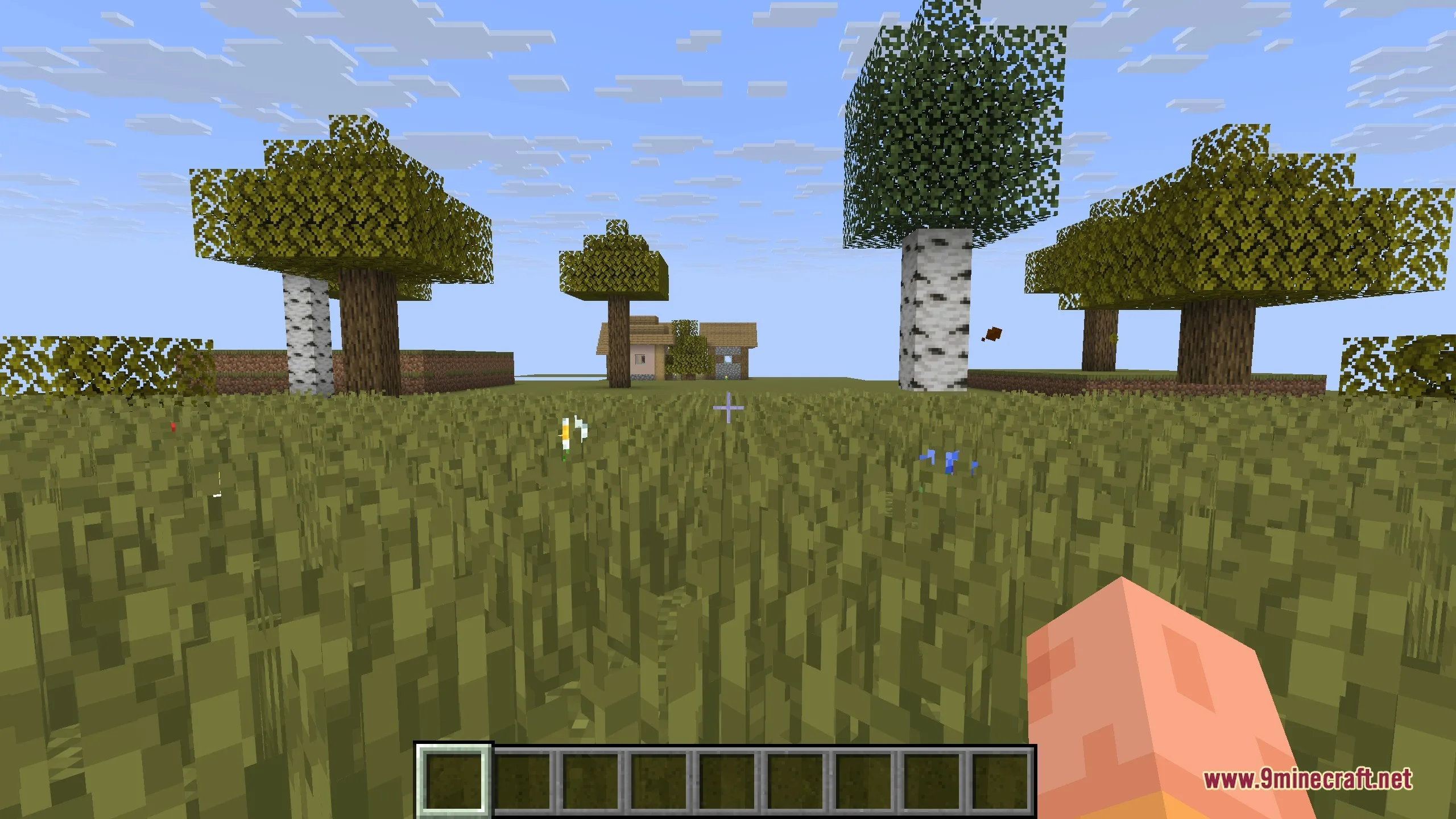 Warm yellow and brown foliage during the autumn season in a Minecraft world