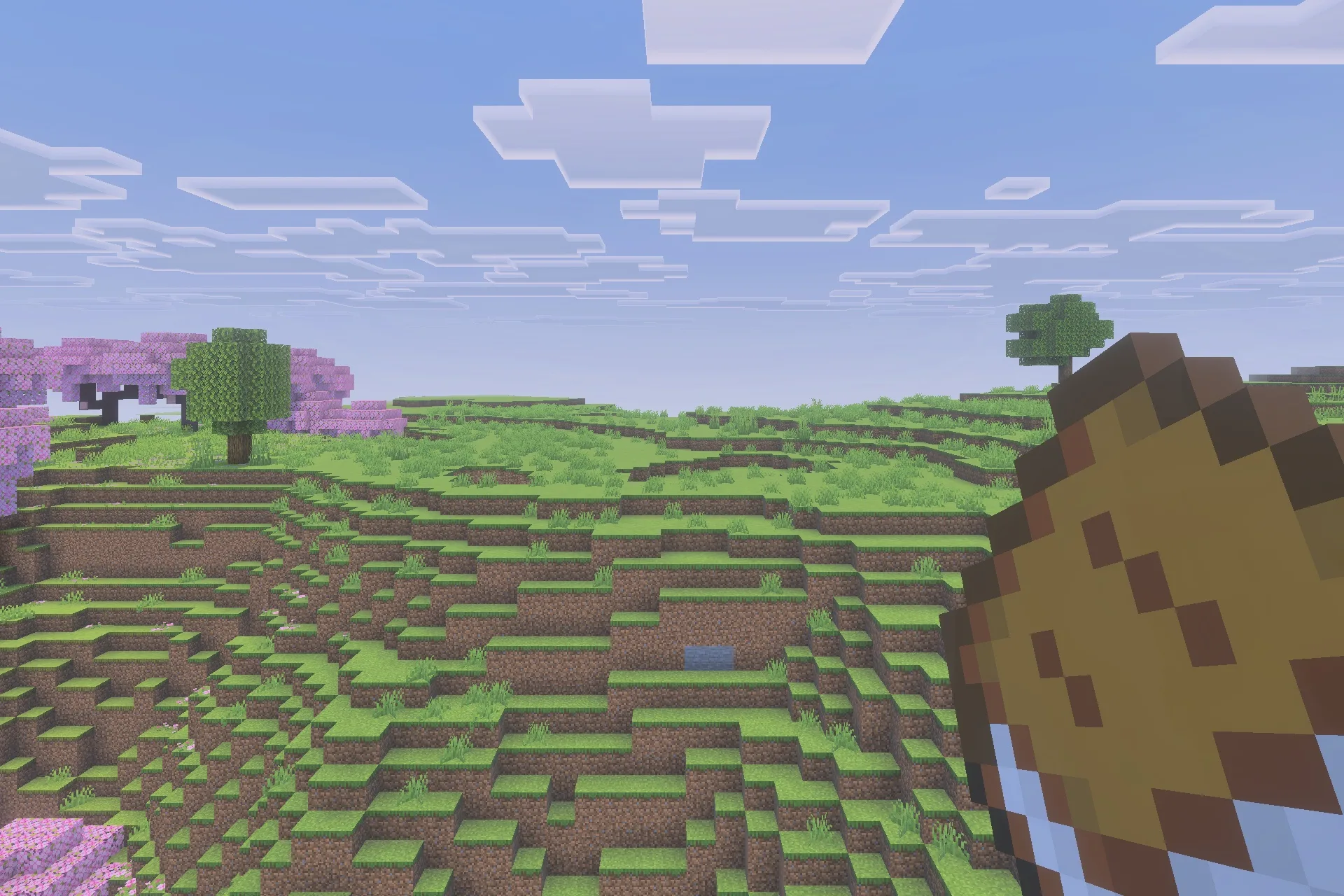 Simple Backpack Achievement Friendly No Lag Addon Screenshot 3 A player holds a Simple Backpack item while exploring a cherry blossom biome