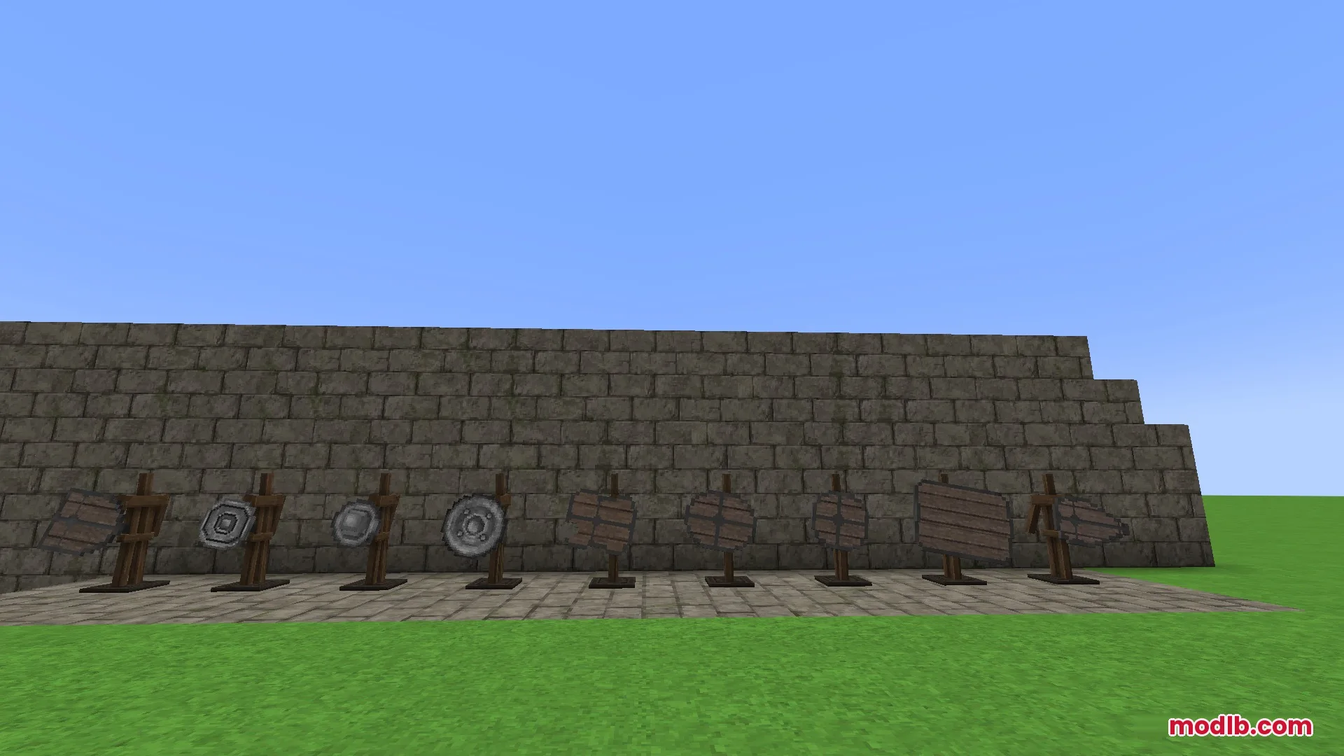 Steel Crown Heritage Resource Pack Screenshot 7 Various medieval shields displayed on wooden stands against a stone wall