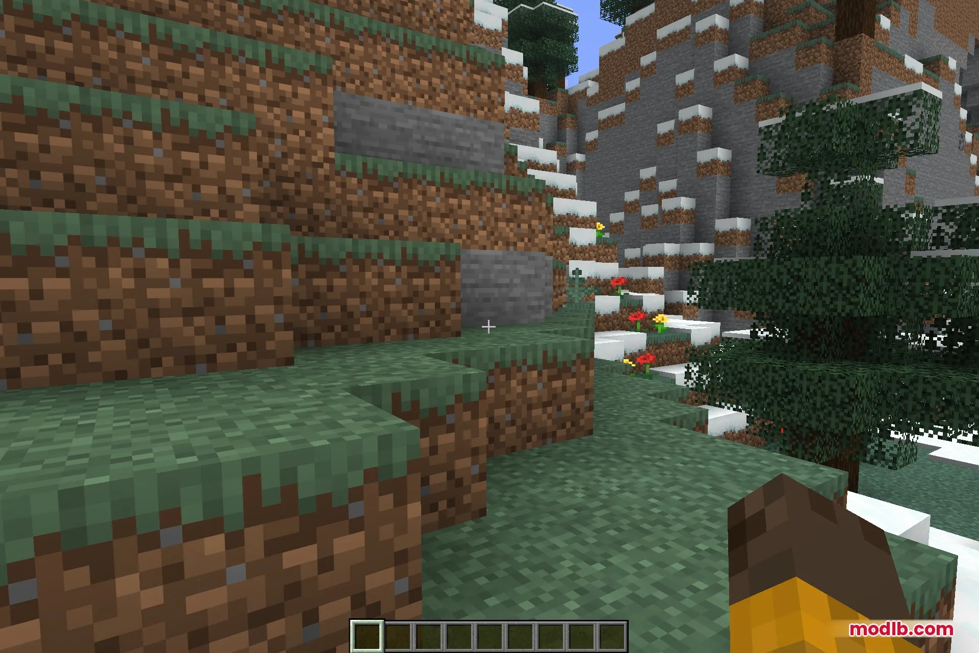 A terraced slope where the steep faces have come out as stone