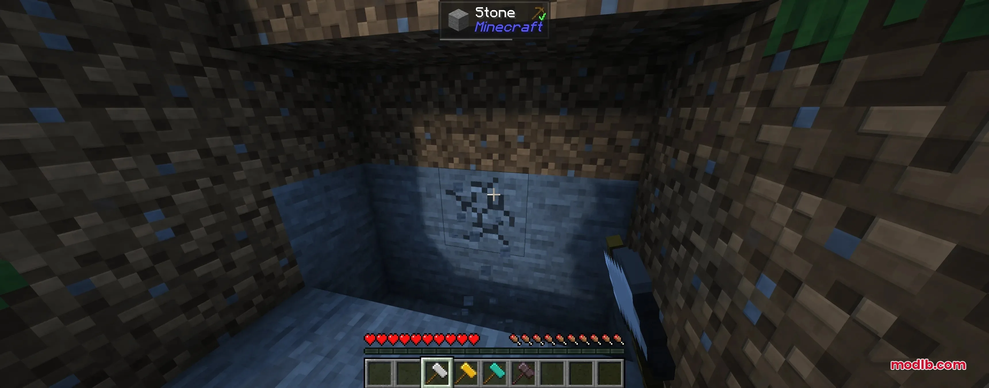Tectonic Widebore Data Pack Screenshot 2 Player mining a large area of stone blocks with a heavy white hammer