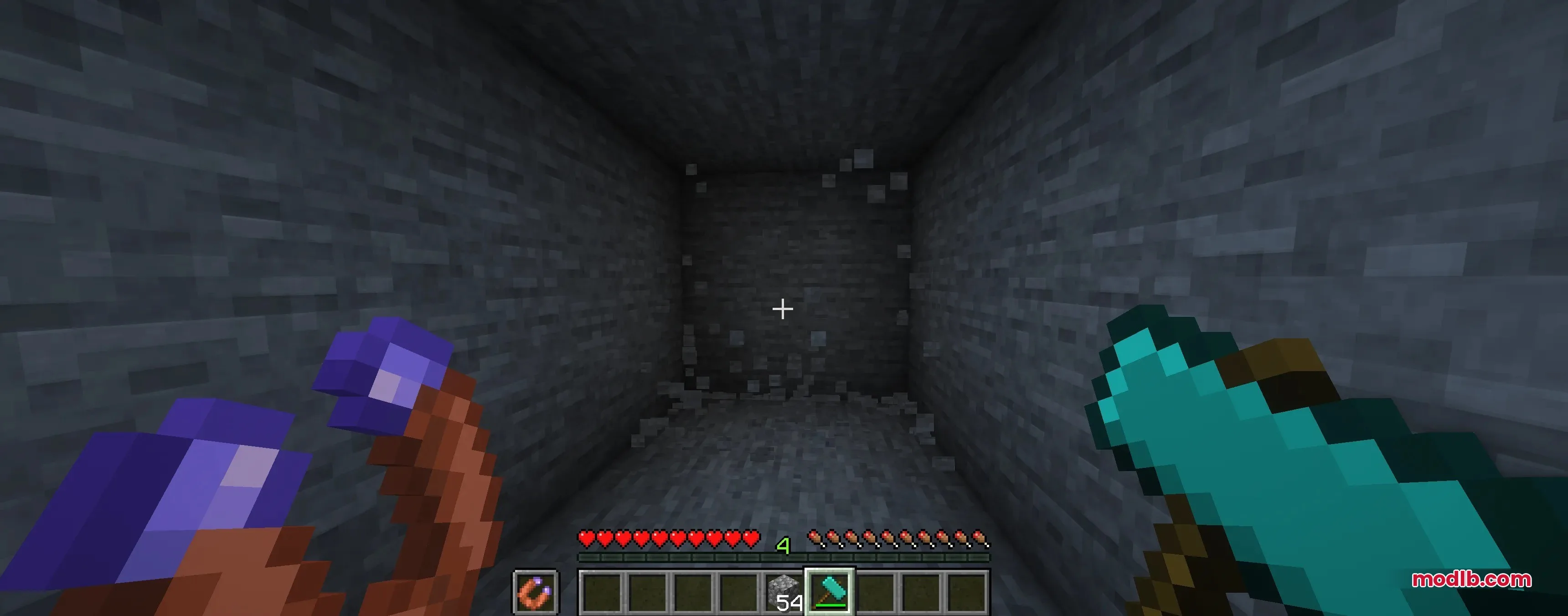 Tectonic Widebore Data Pack Screenshot 5 Player holding a diamond hammer and magnet while mining in a stone cave