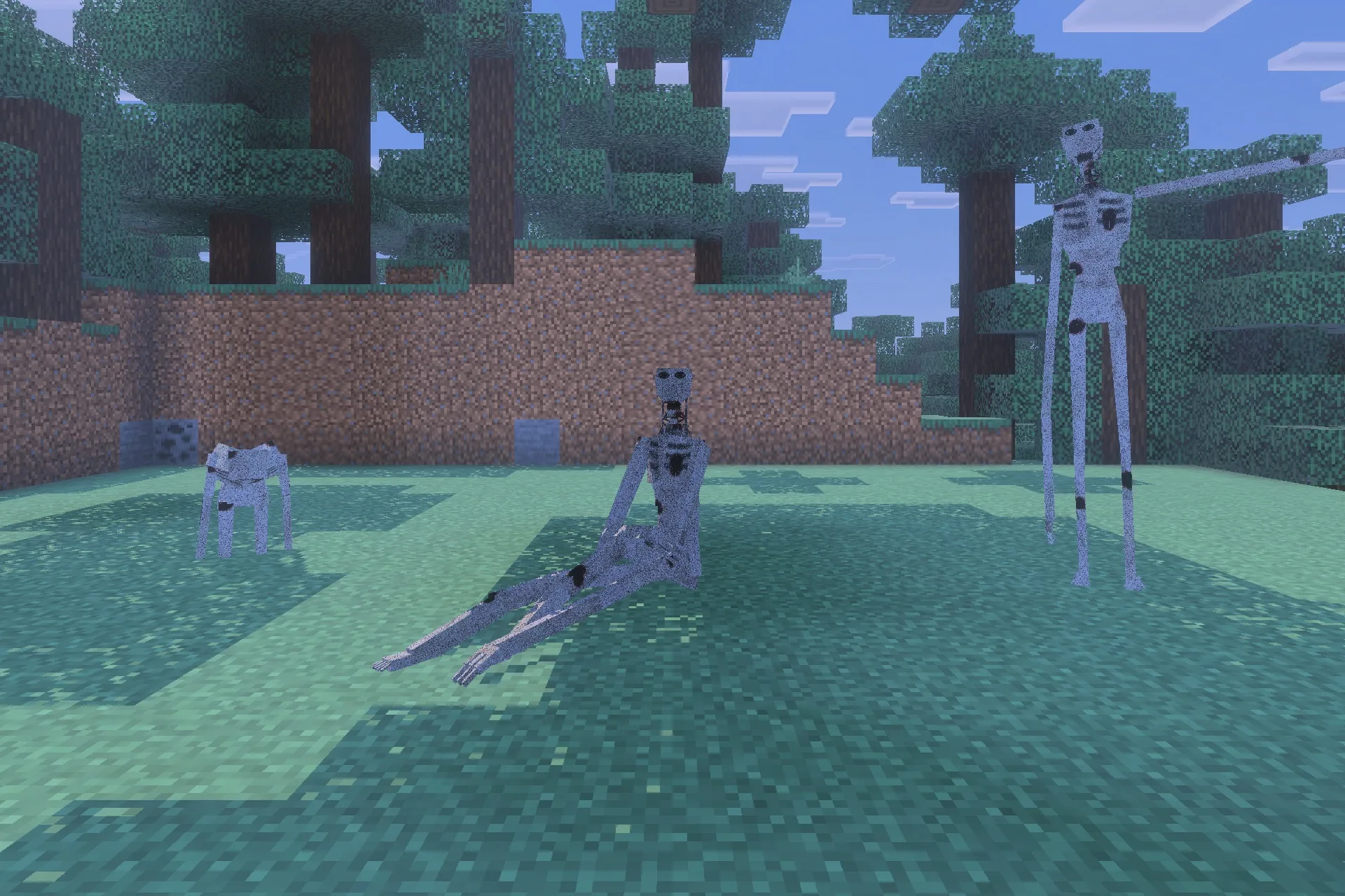 Three creepy grey entities with long limbs gather in a forest clearing