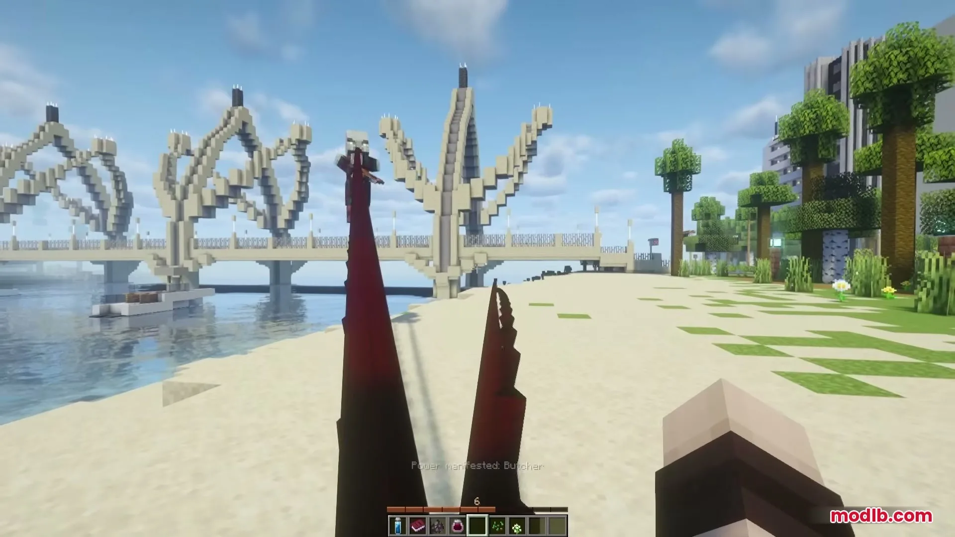 Player uses red claws to attack on a beach near a bridge
