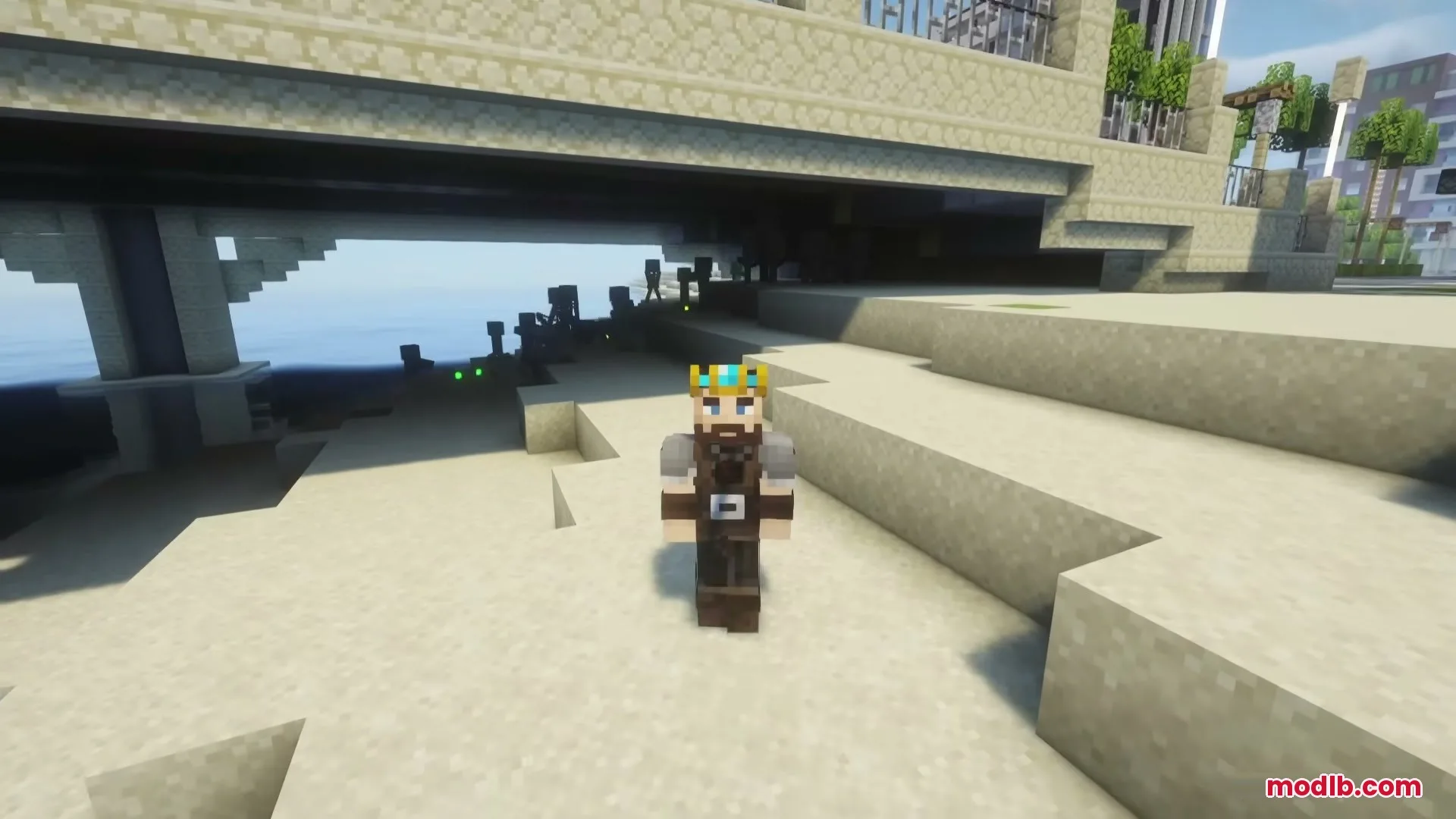 Crowned Minecraft character stands on sand in the shade of a bridge