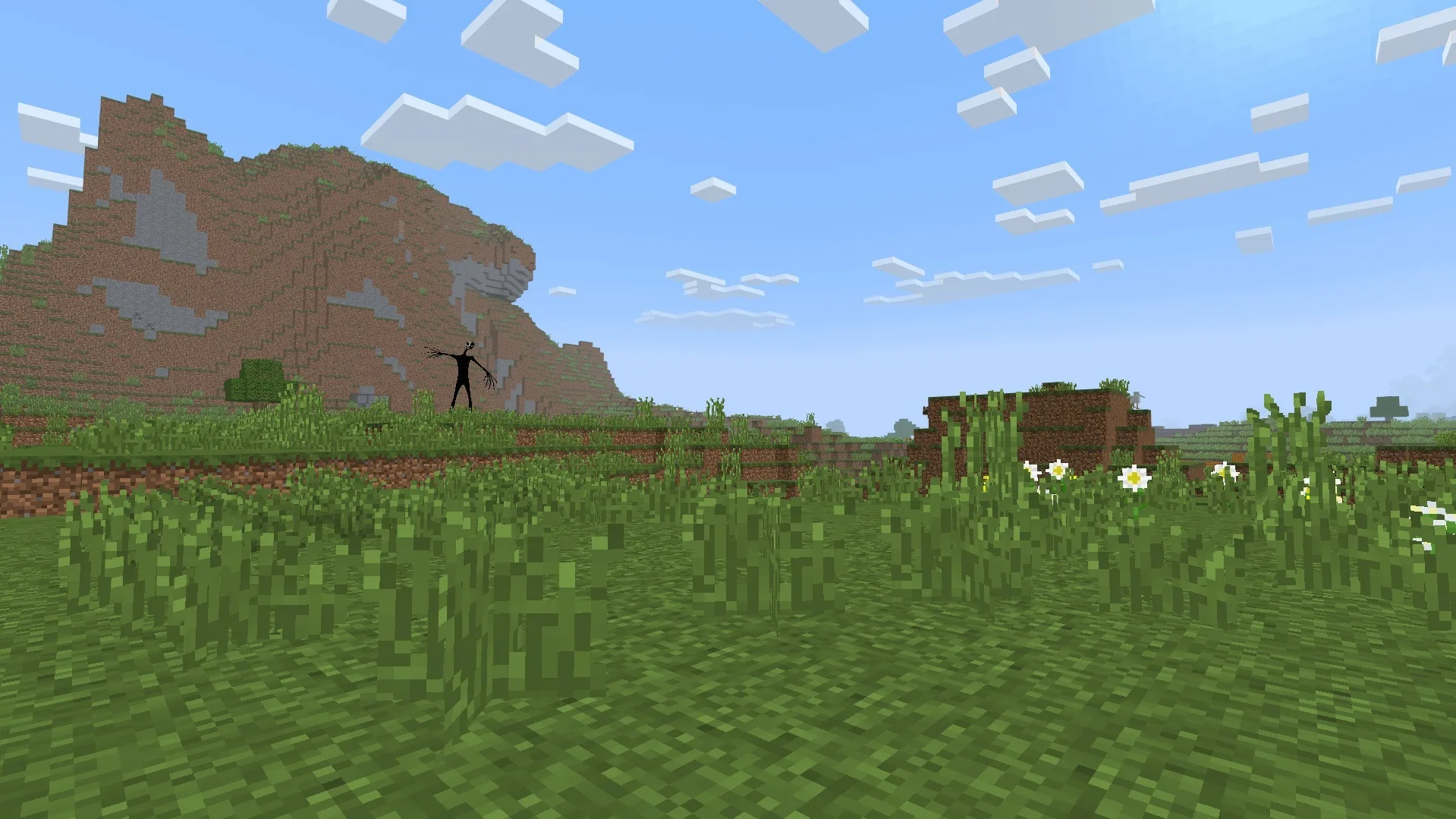 Twixxel's Stalkers Addon Screenshot 3 Twixxel Stalkers Addon features a tall black monster standing on a grassy hill