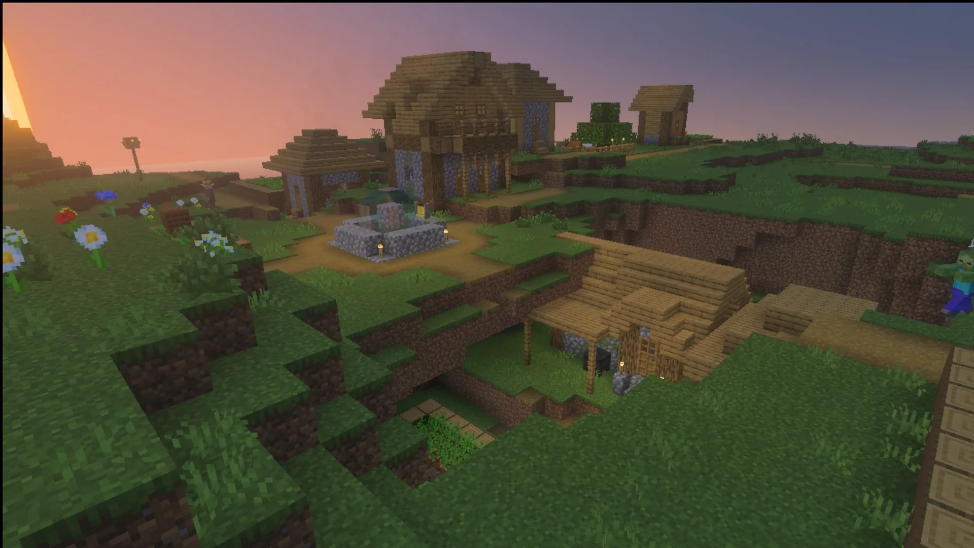 Ultimate Survival Texture Pack Screenshot 9 Wooden houses and a village fountain at sunset with the Ultimate Survival pack