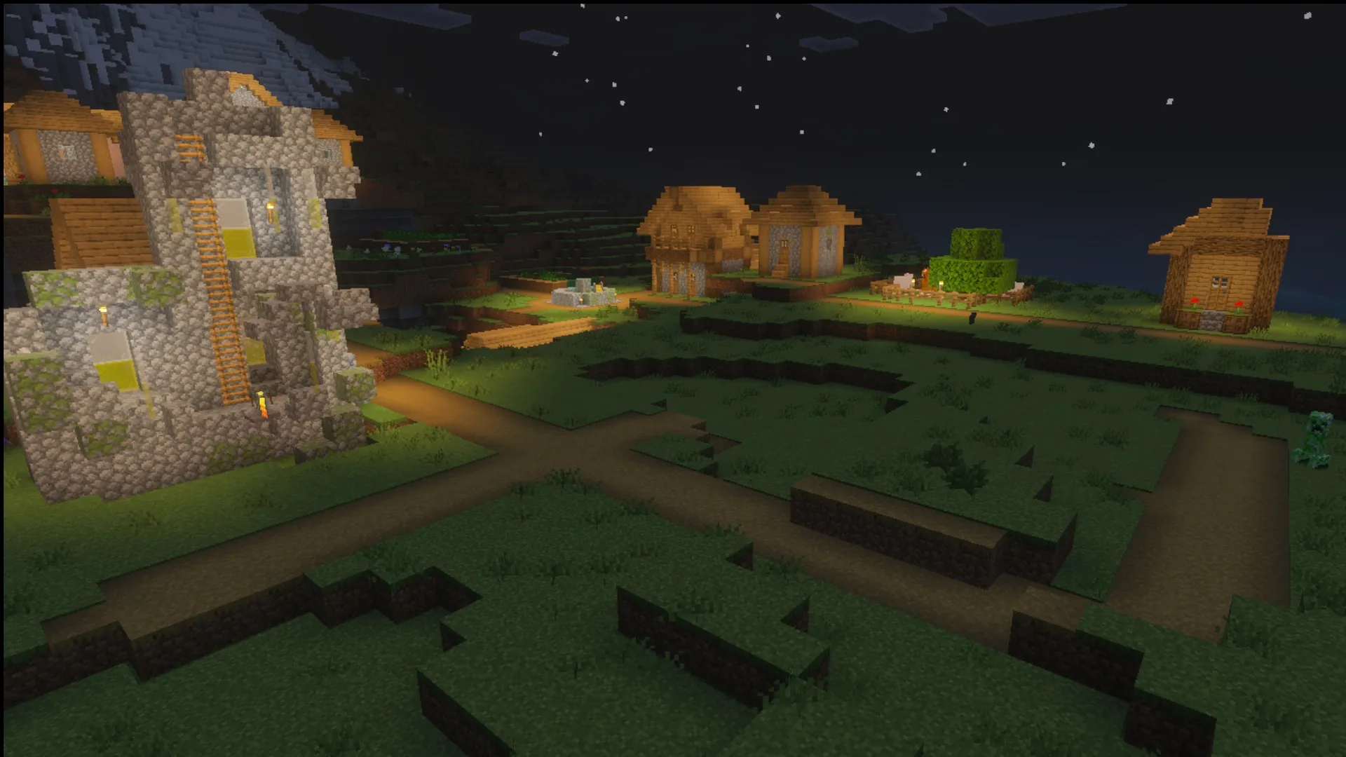 Ultimate Survival Texture Pack Screenshot 10 The village at night showing lighting and glowing blocks in the Ultimate Survival pack