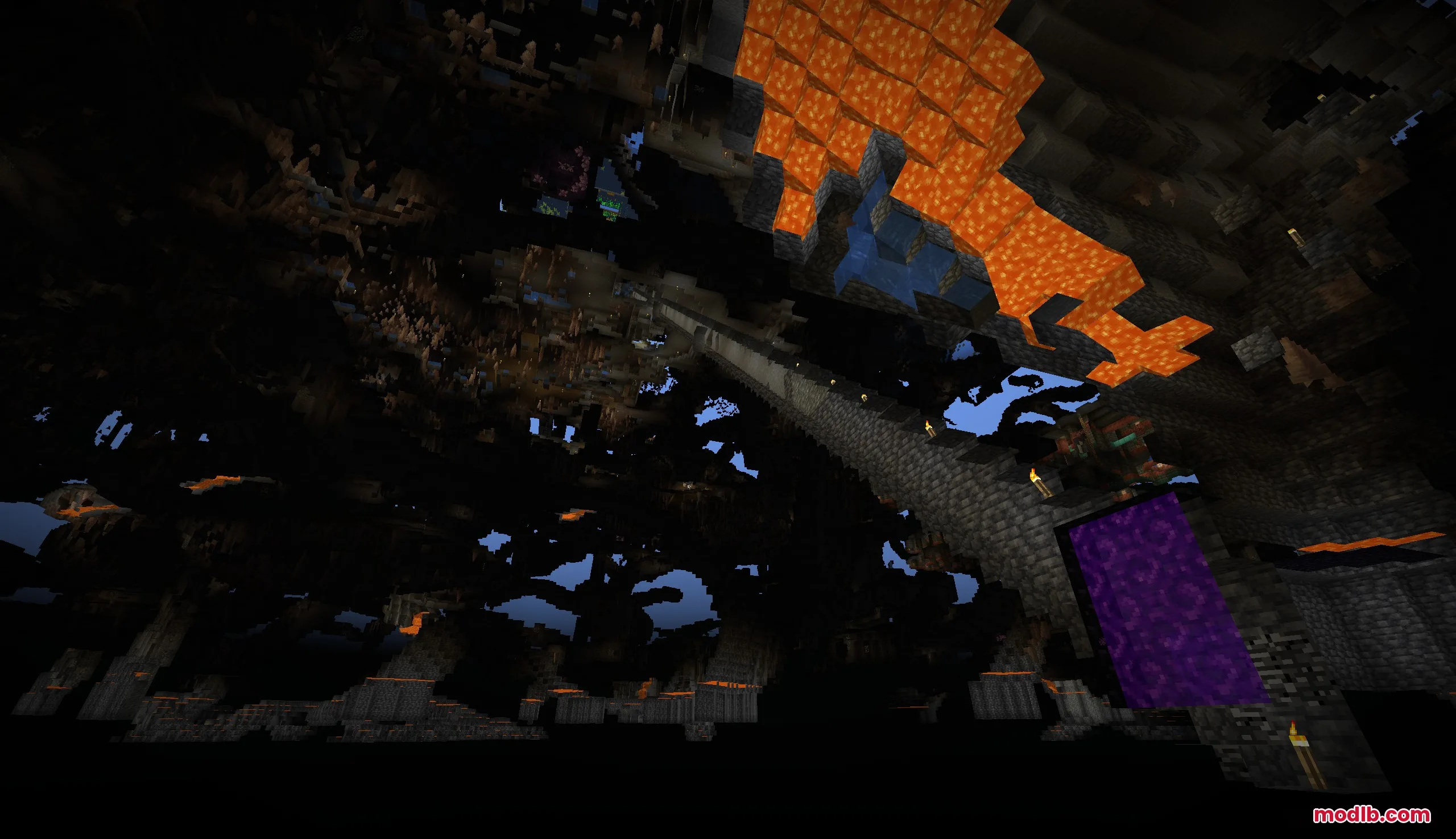 Voidbound Resolve Mod Screenshot 5 An expansive underground cavern featuring a Nether portal and a long stone bridge