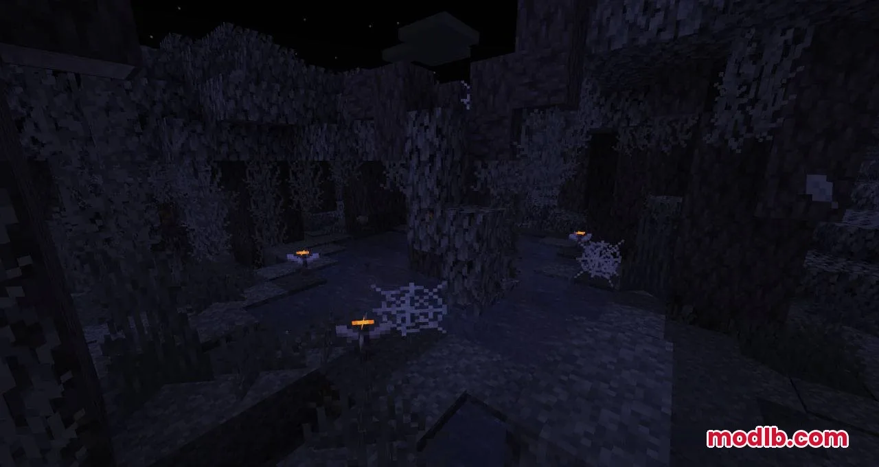 Small glowing structures and cobwebs scattered throughout the dark Pale Garden biome