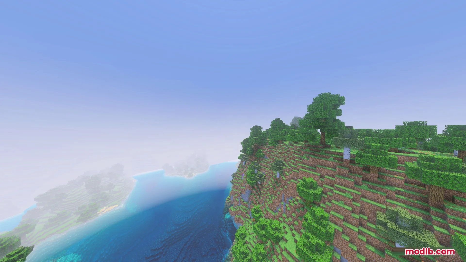 ZZZ VIBRANT VISUAL Shader Screenshot 1 High angle view of a grassy cliff overlooking a misty blue ocean