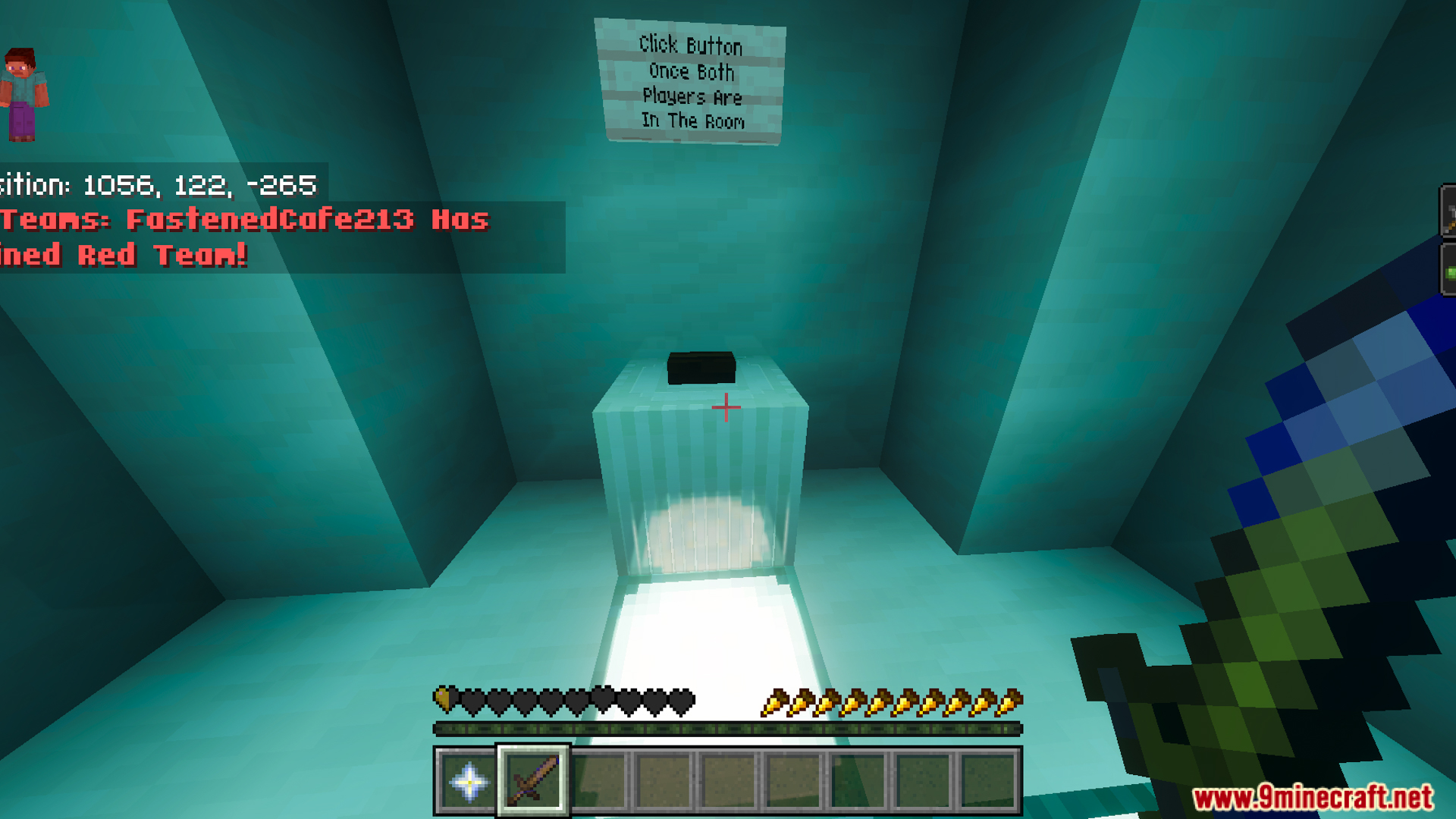Player standing in a cyan room with a button and a sign