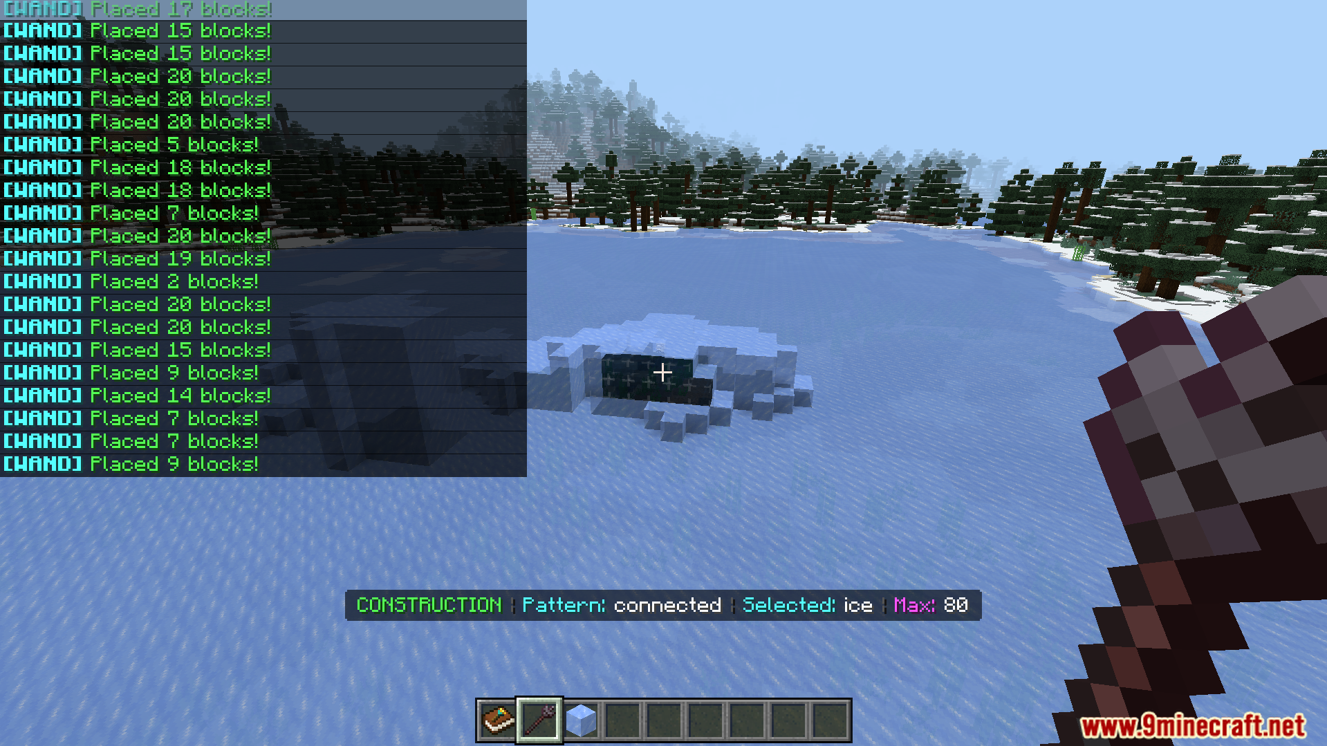 Construction Wands Addon Screenshot 7 Player using construction wand to place connected ice blocks on frozen lake