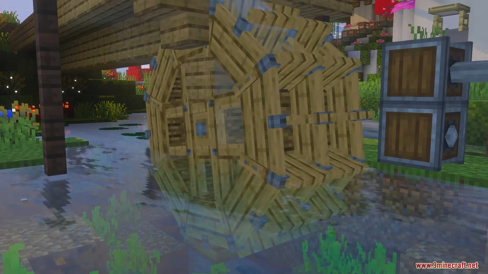 Create Bedrock Addon Screenshot 1 Large wooden water wheel structure placed in a shallow river generating power