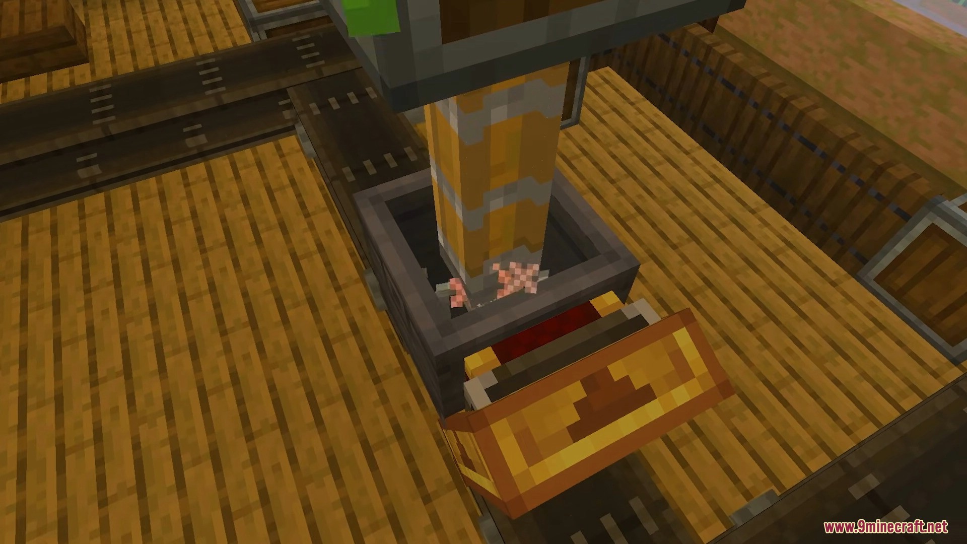 Create Bedrock Addon Screenshot 9 Mechanical press crushing items in a basin on a conveyor belt