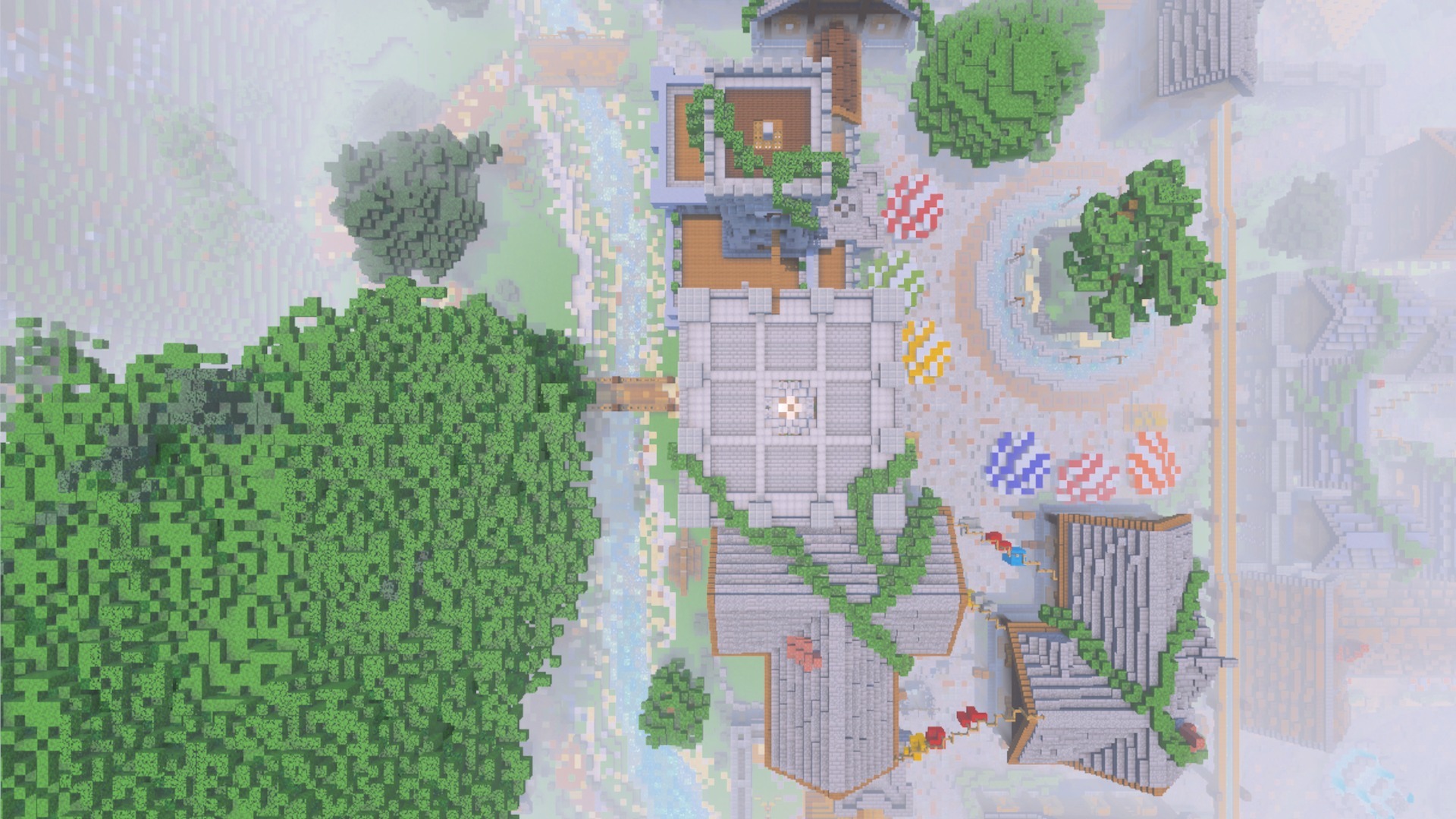 Aerial view of a Minecraft town with a river and colorful market stalls