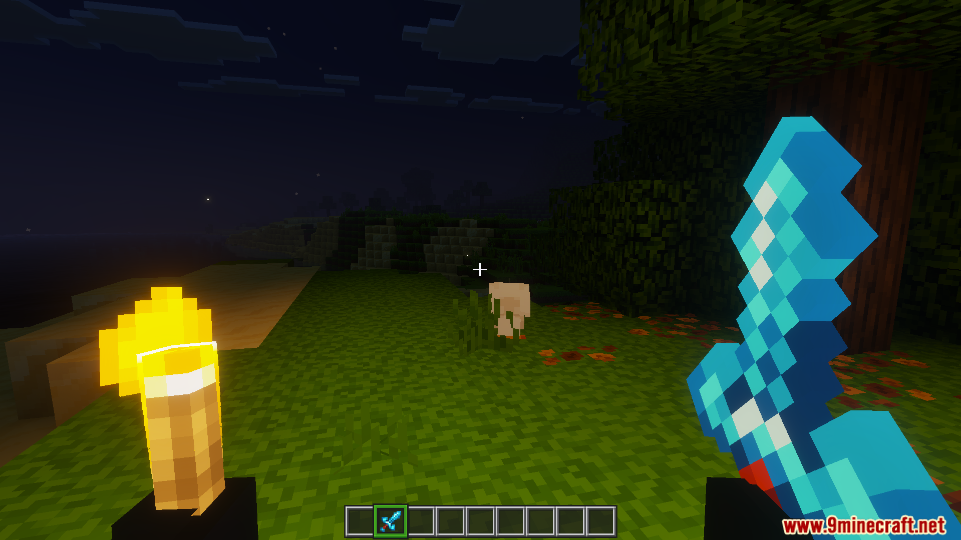player holding glowing torch in left hand to light up the dark area