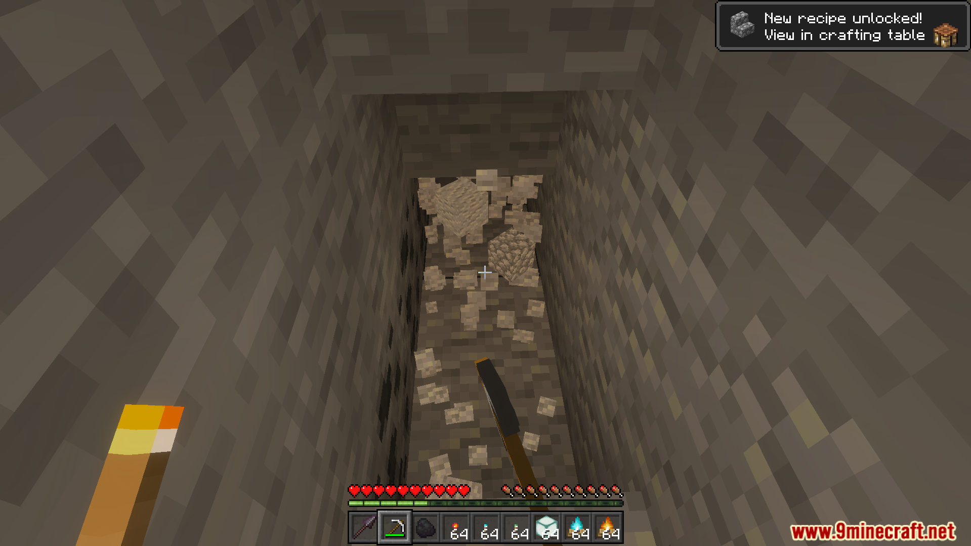 Dynamic Lighting and Offhand Addon Screenshot 5 Player using Dynamic Lighting And Offhand Addon to hold a torch while mining coal