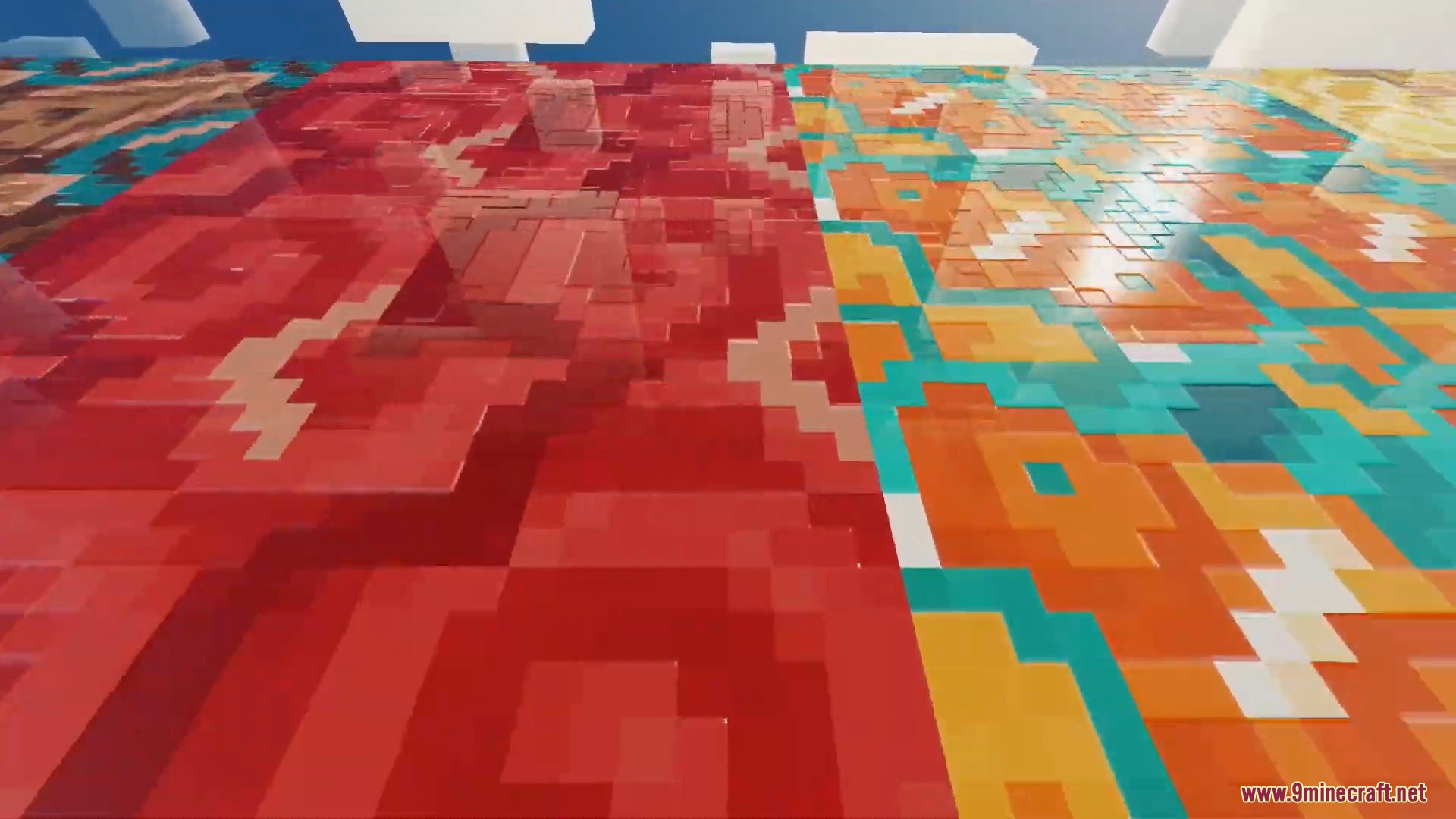 Glossy patterned blocks reflecting the sky in a close up view