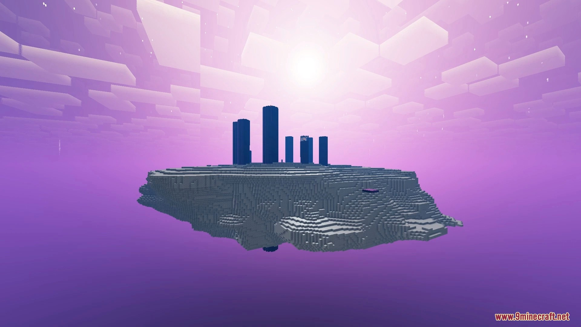 Floating End island with tall obsidian pillars and bright sun in purple sky