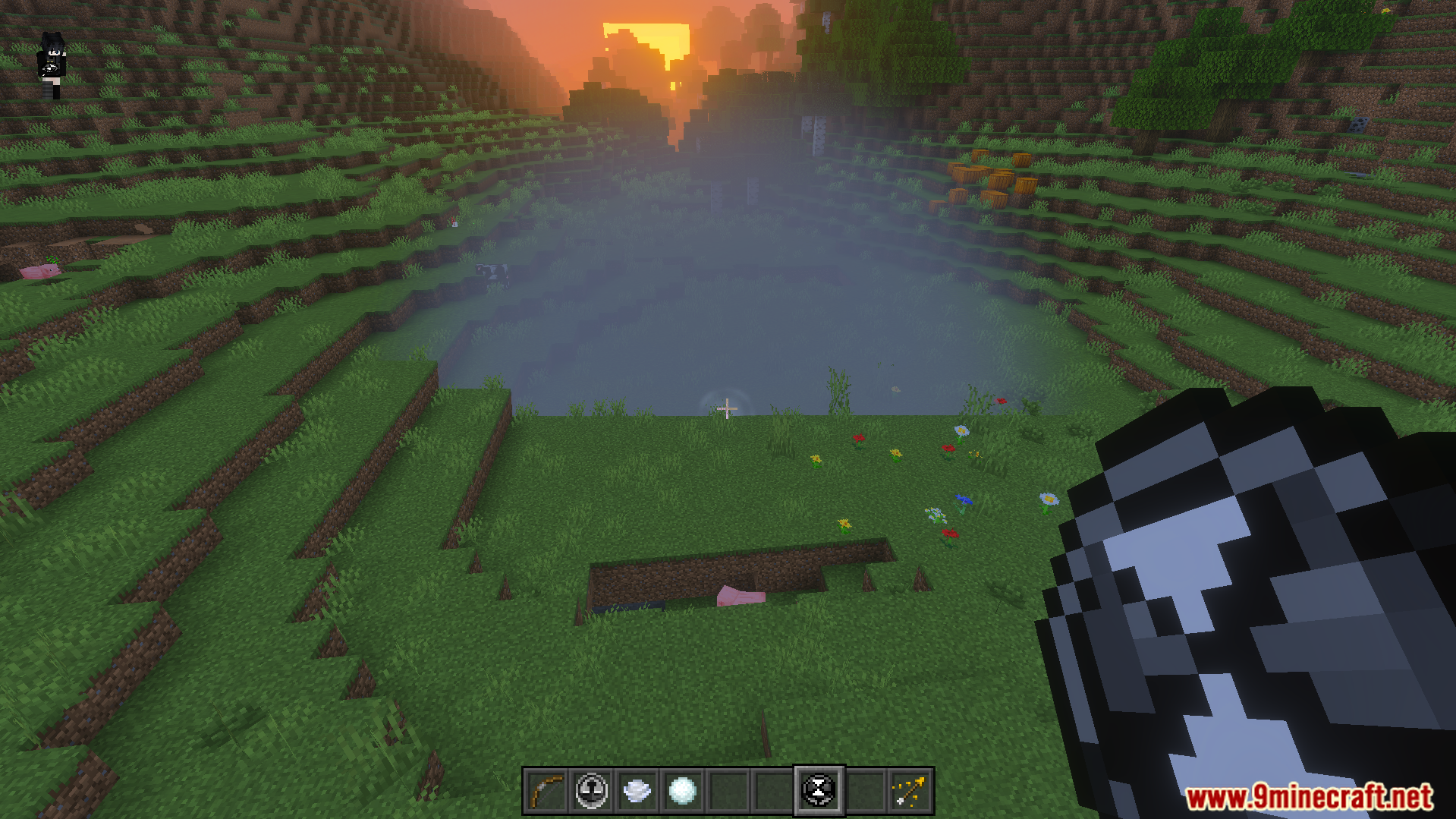 Howards Time Stop Addon Screenshot 7 Howards Time Stop Addon player holding a quantum bomb overlooking a large crater